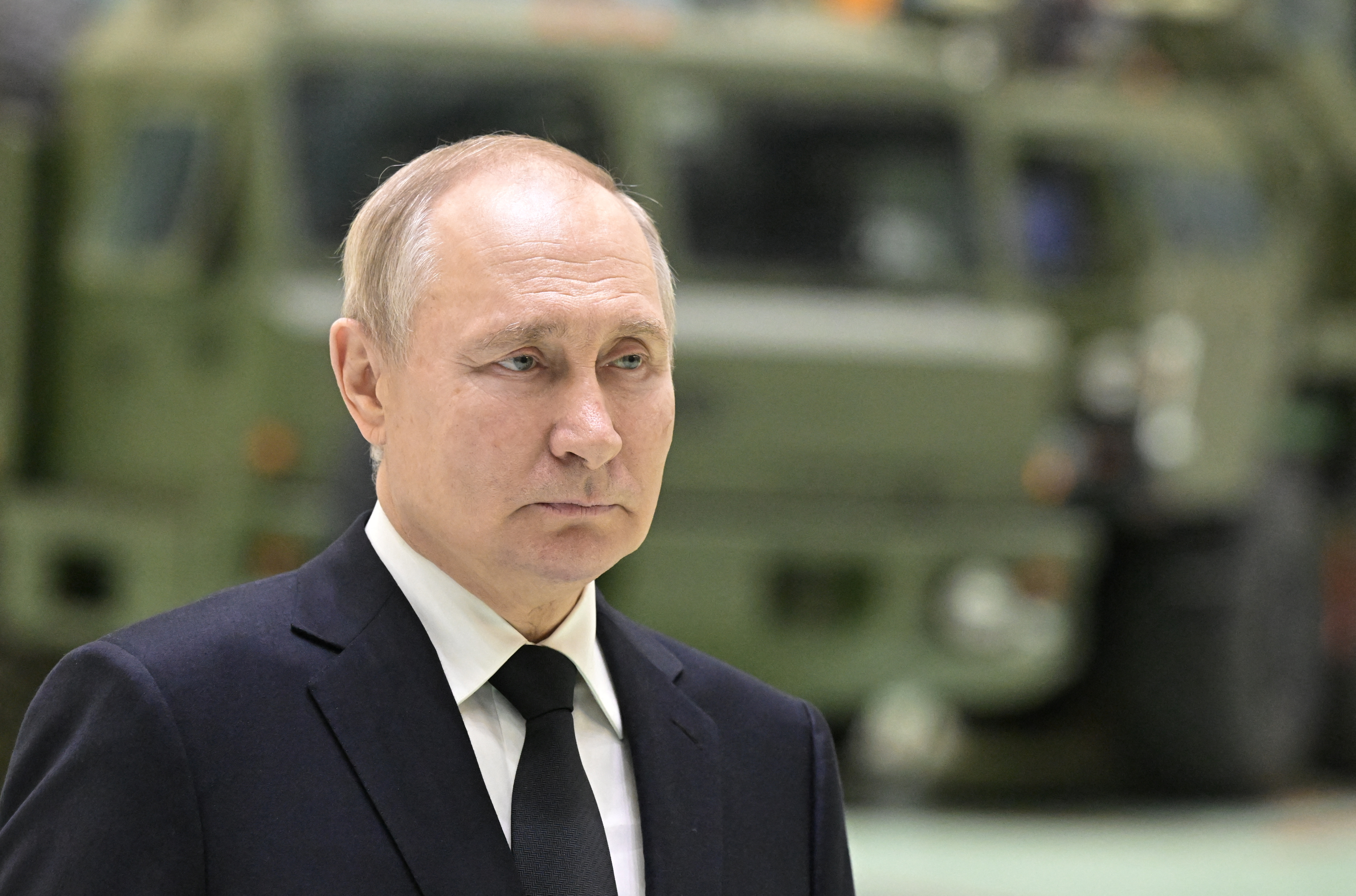 Russian President Vladimir Putin visits a plant of missile manufacturer Almaz-Antey in St Petersburg