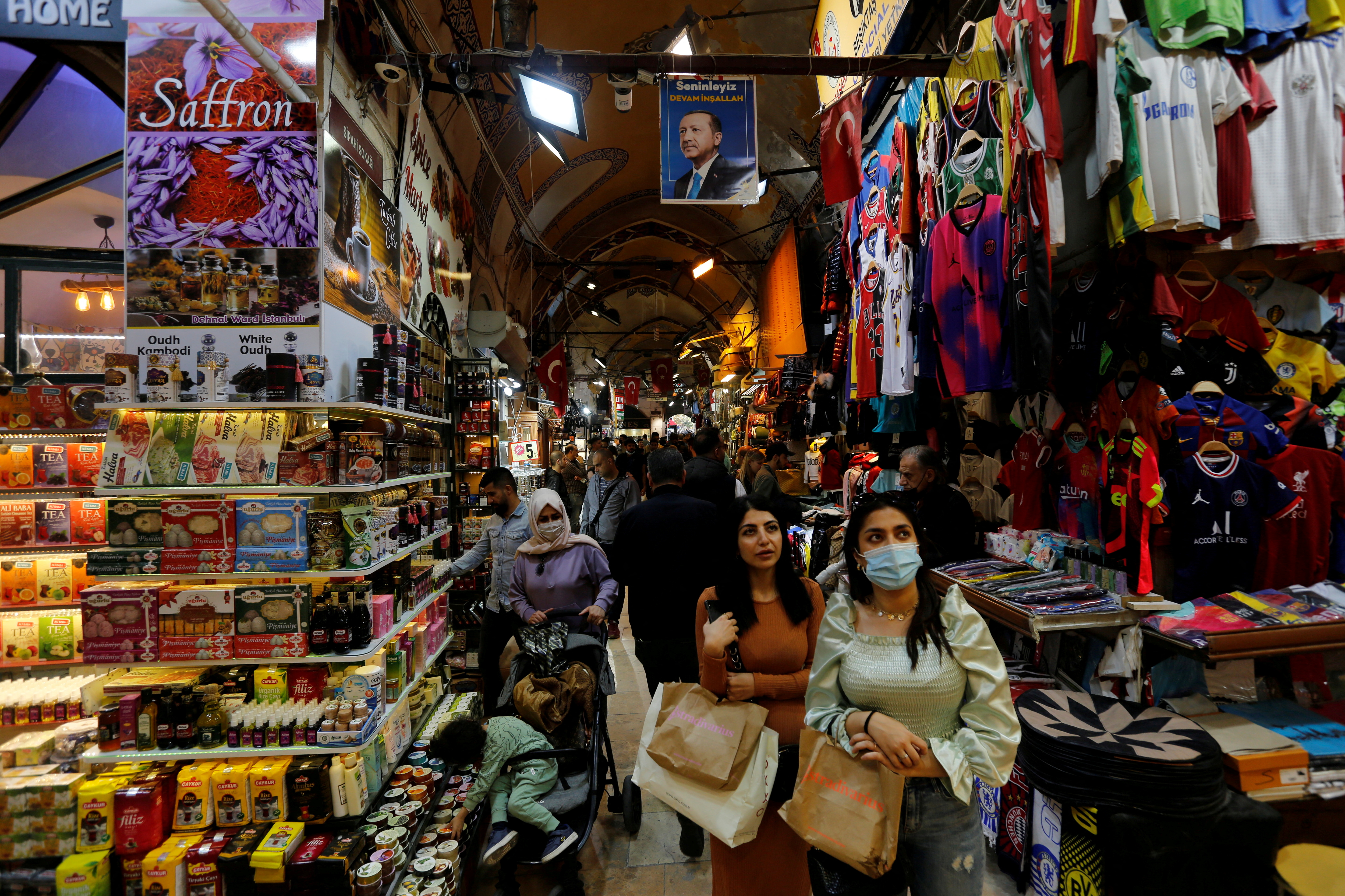 Locals and foreign tourists shop at the Grand Bazaar in Istanbul