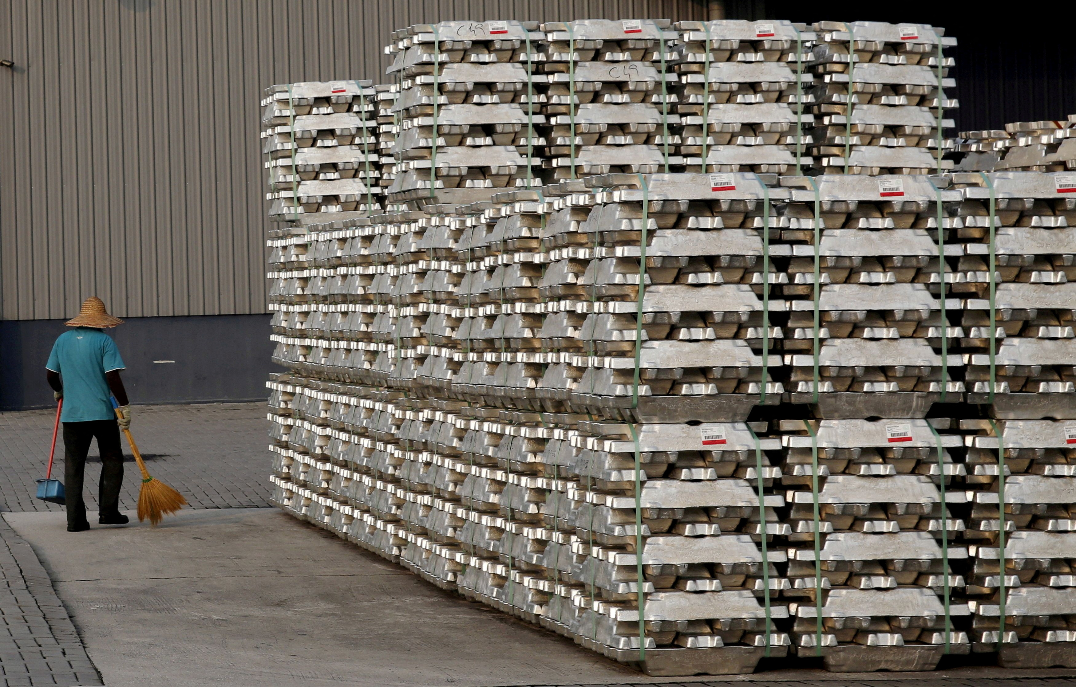 Aluminium ingots outside a warehouse that stores London Metal Exchange stocks in Port Klang Free Zone in 2015