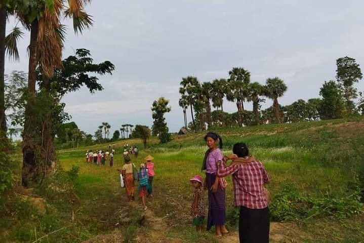 Displaced people flee violence at the town of Depayin in Myanmar's Sagaing region