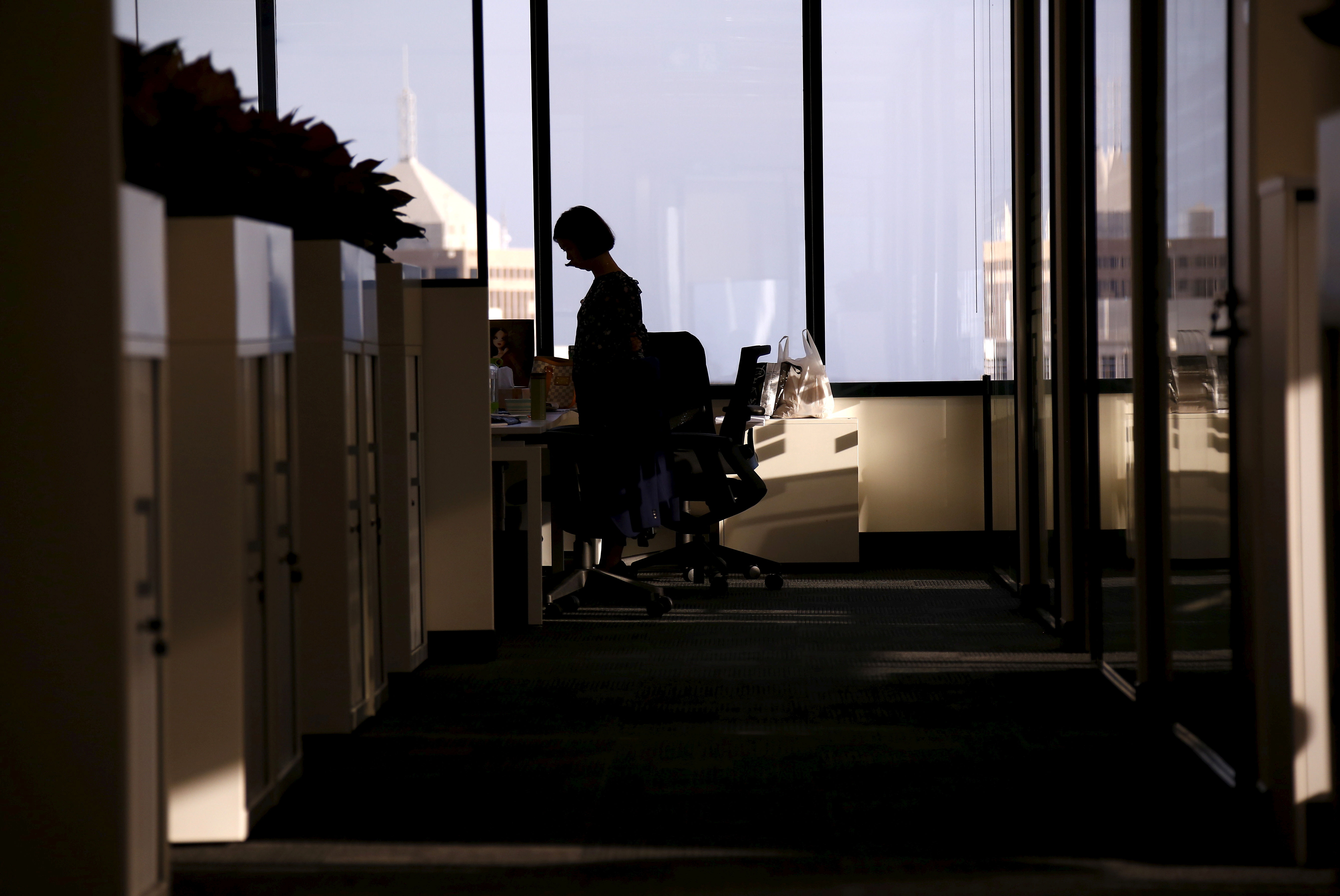 An employee of software company Nuix stands in their office located in central Sydney, Australia