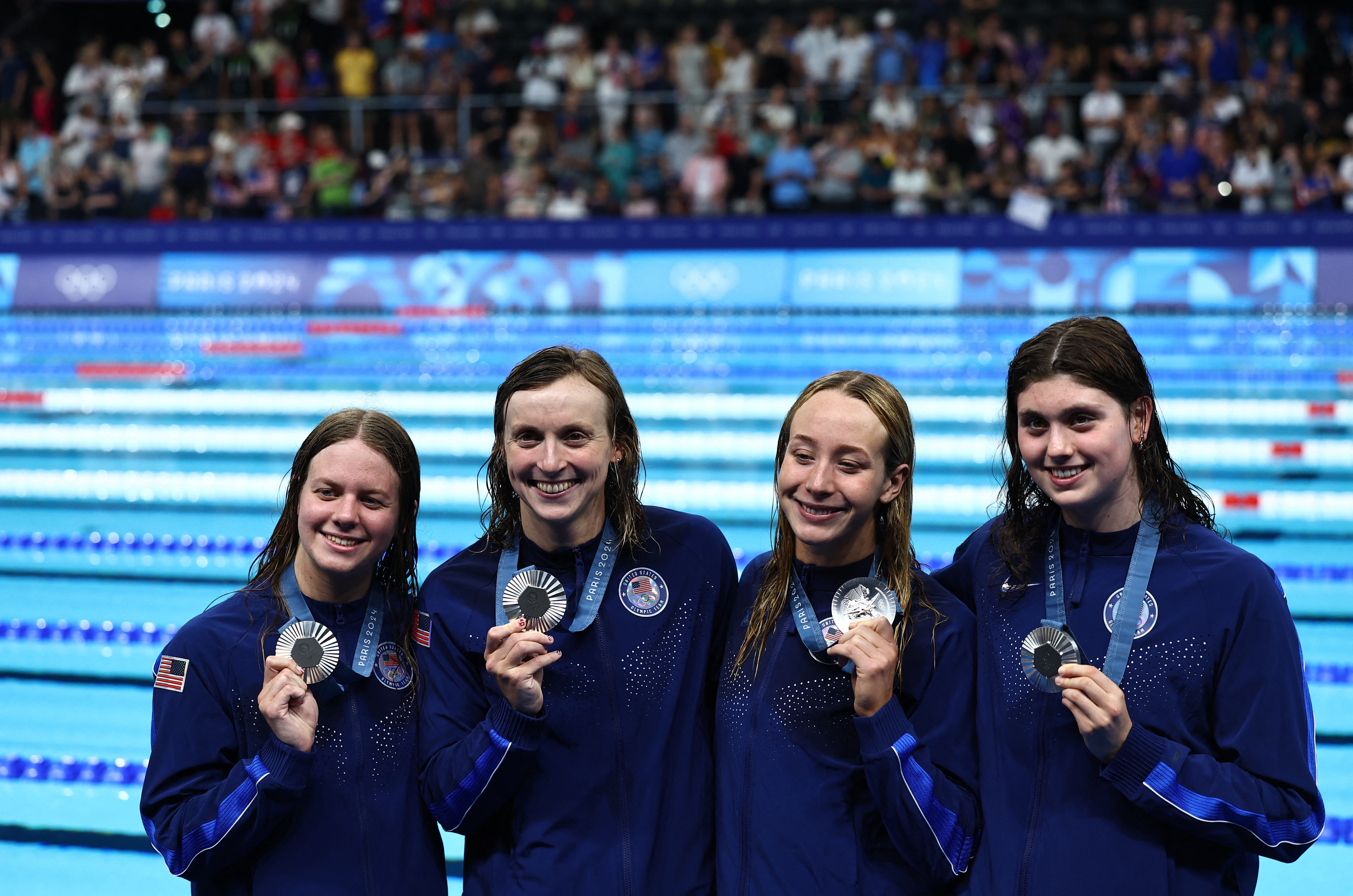 Swimming - Women's 4x200m Free Relay Victory Ceremony