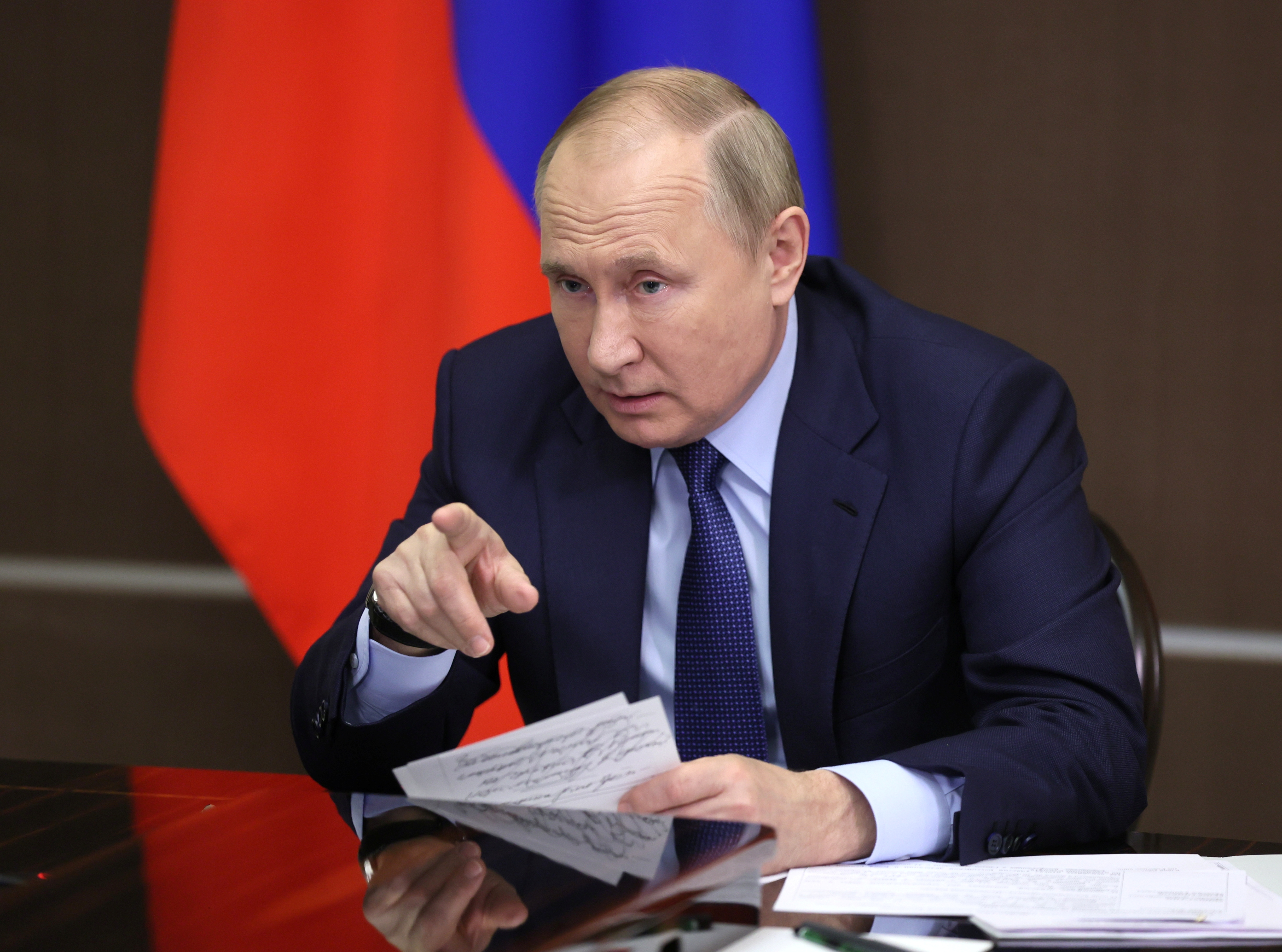 Russian President Vladimir Putin attends a meeting with government members in Sochi