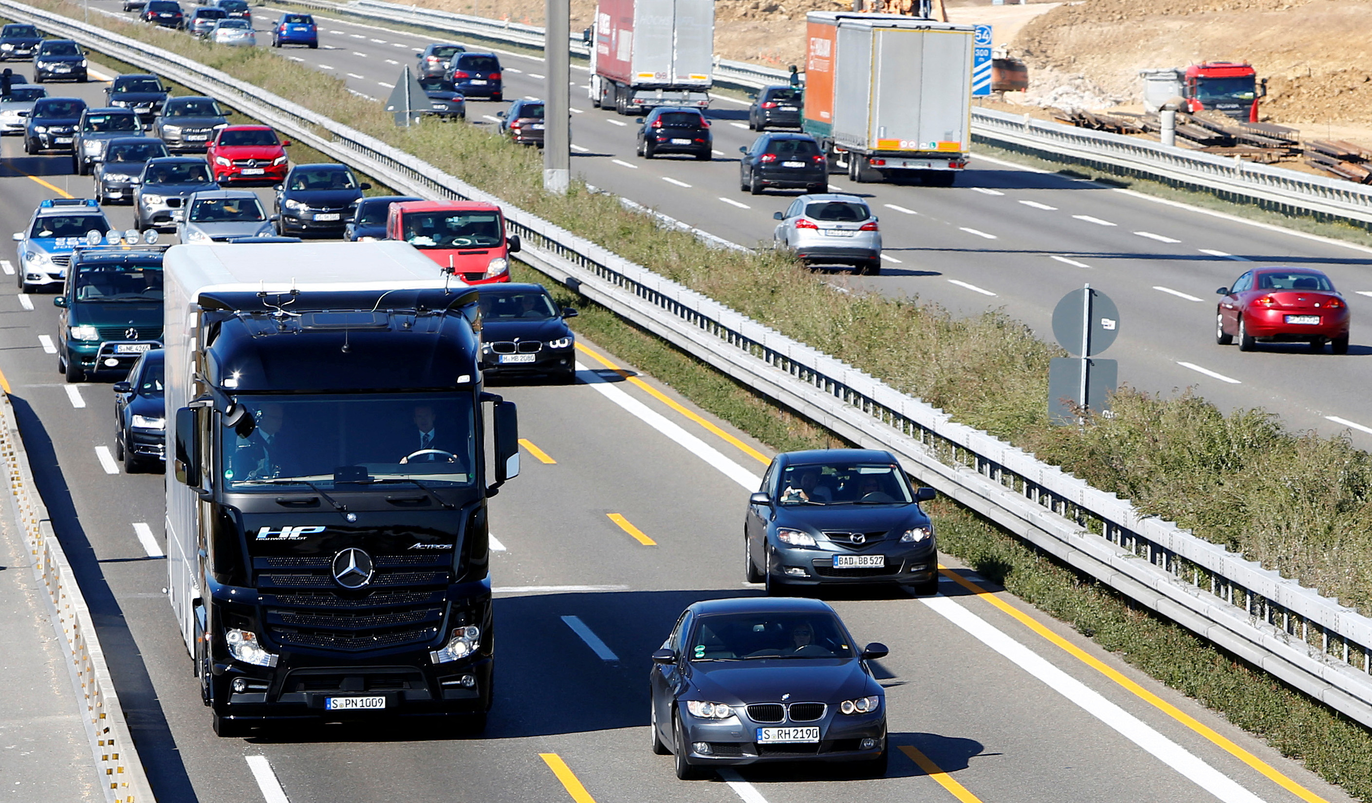 Premiere of Mercedes-Benz autonomous truck Actros driving along public highway between Denkendorf and Stuttgart