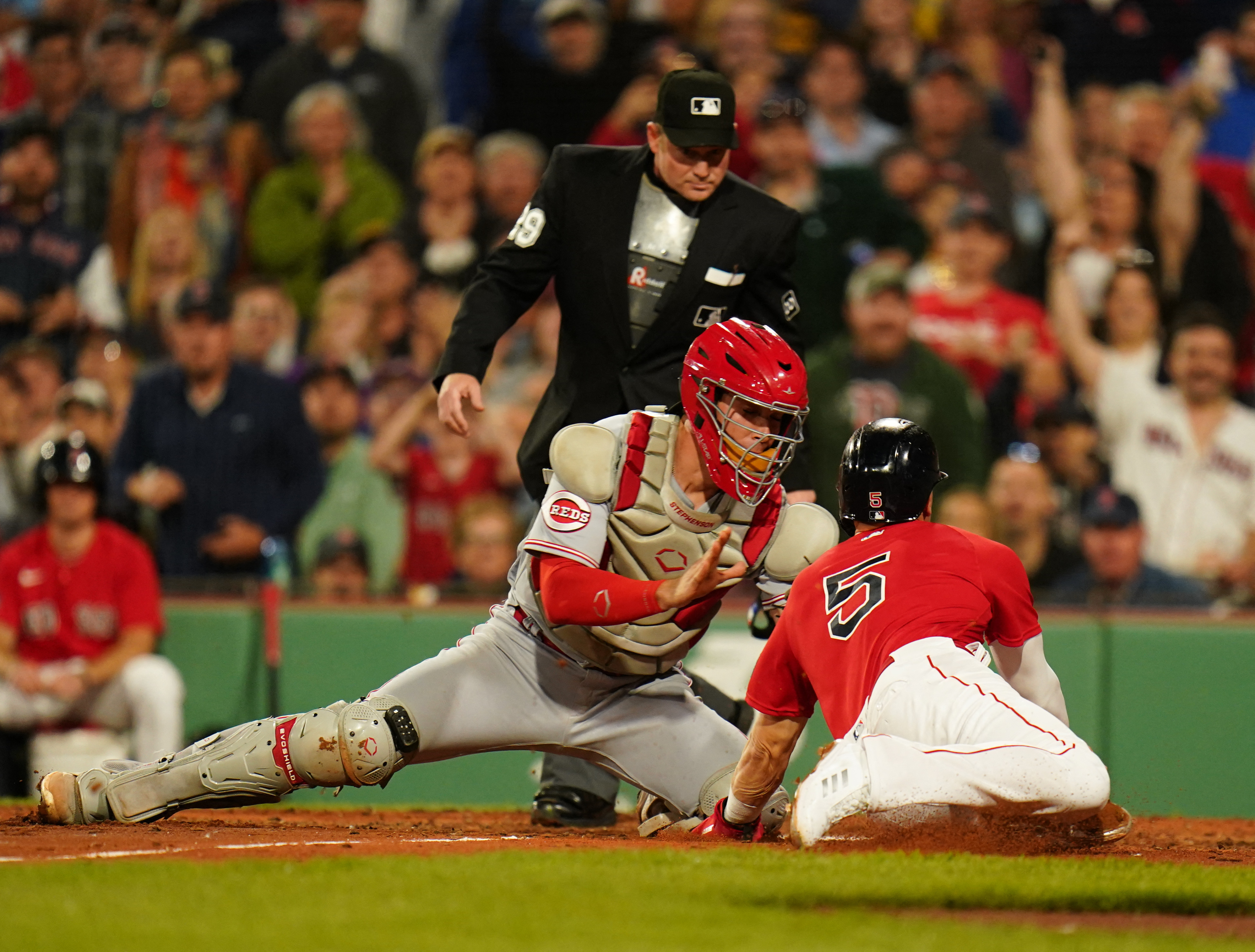 Jose Barrero hits grand slam, Reds withstand Red Sox rally