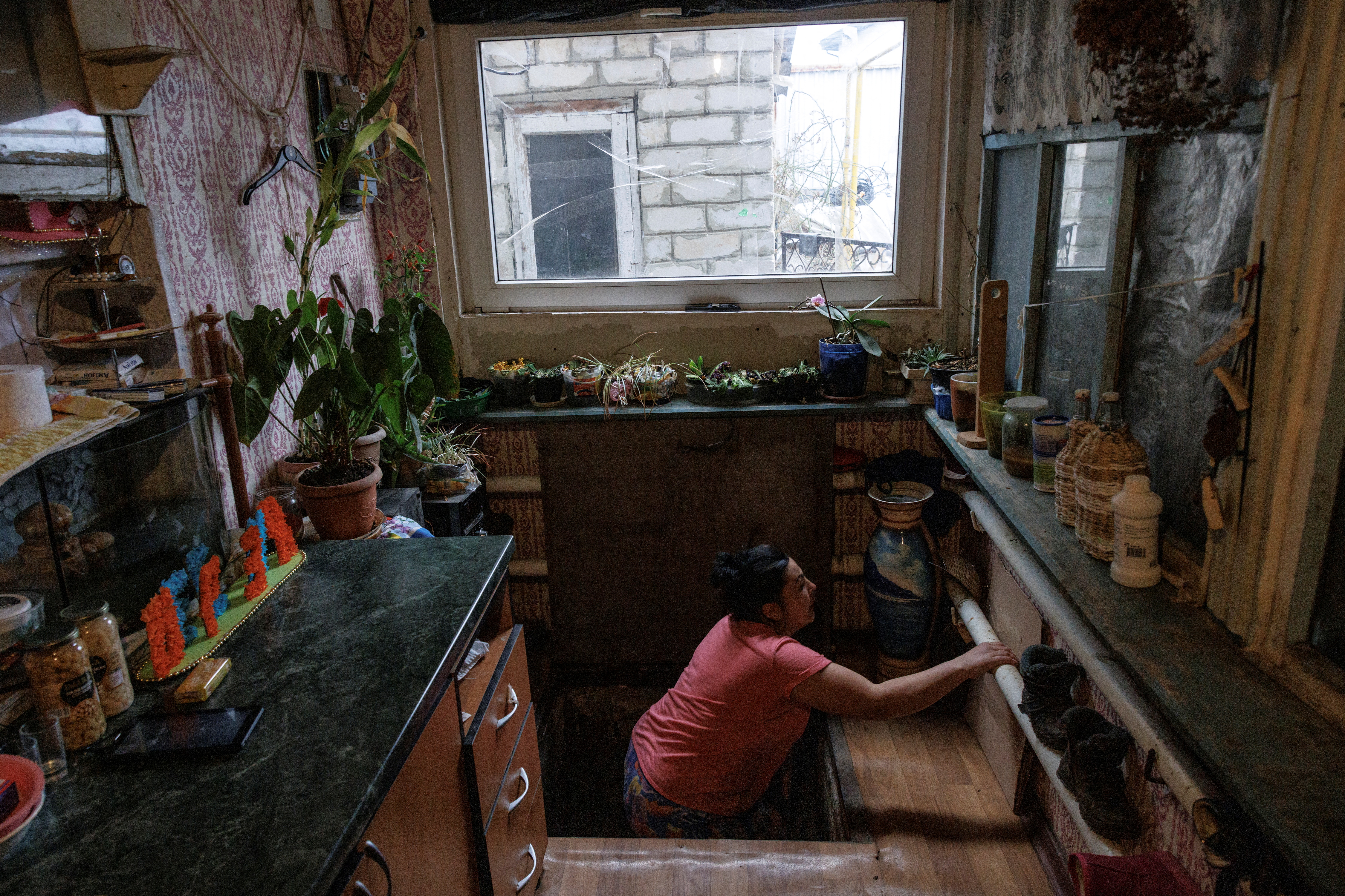 The Wider Image: Inside a Ukrainian village where farmers stay for the wheat harvest but fear Russian attack