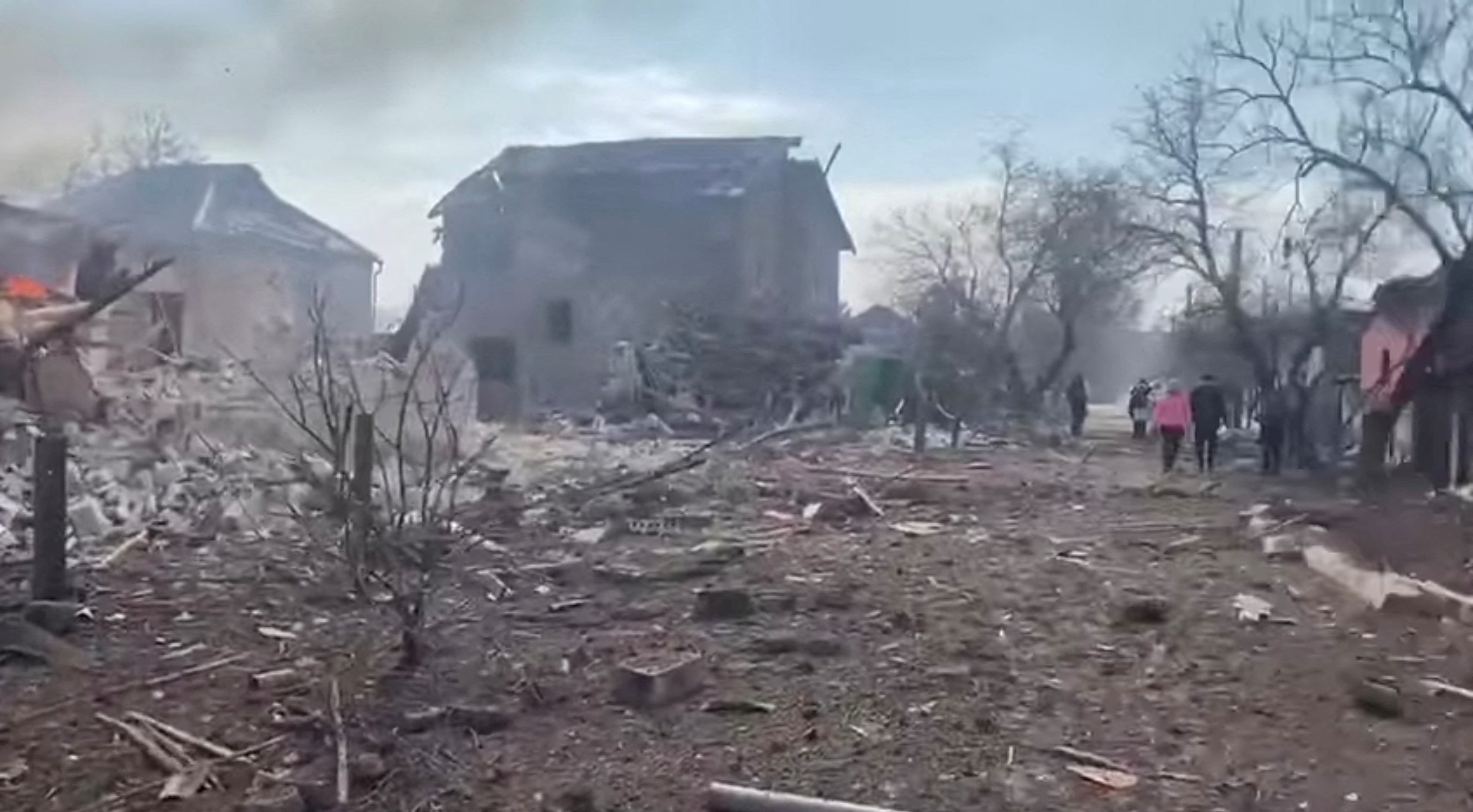 The aftermath of artillery shelling by Russia is seen on a residential area, in Mariupol