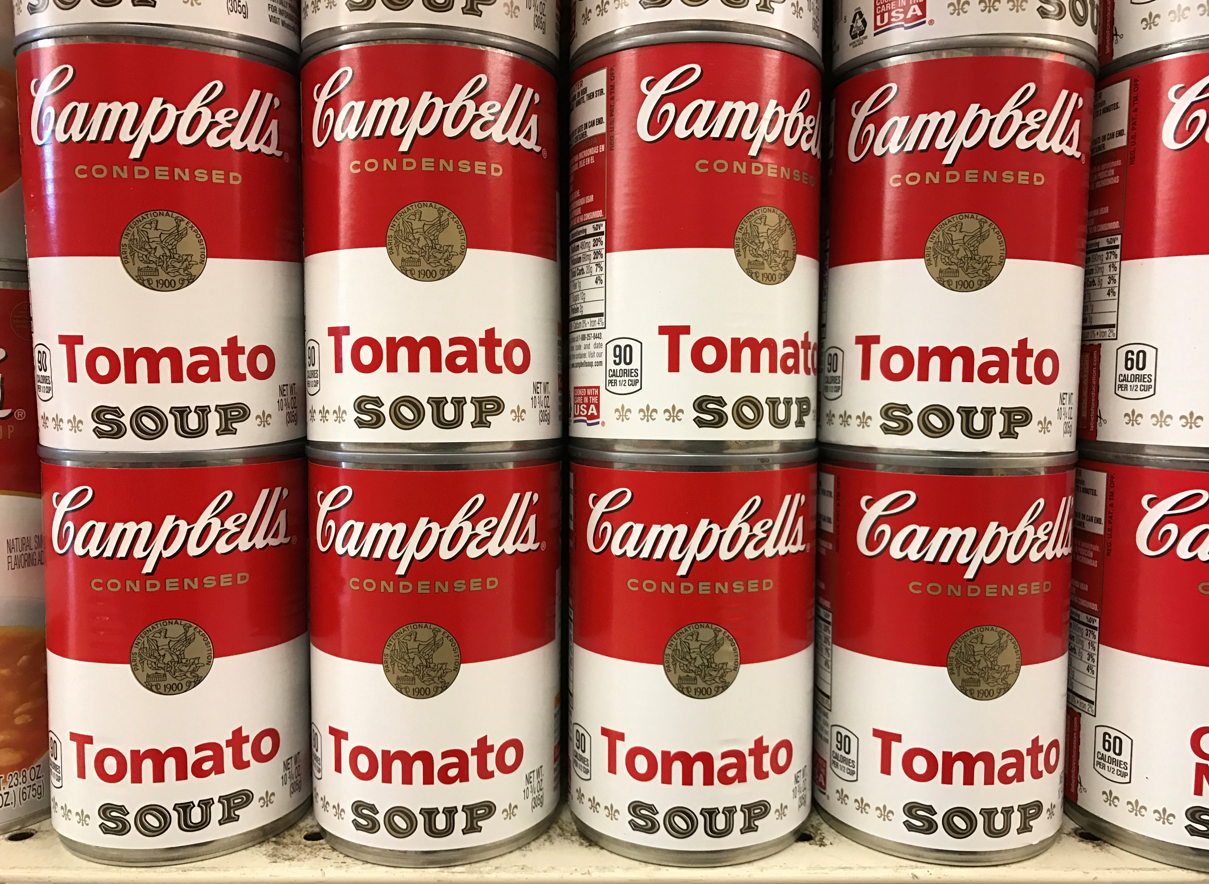 Tins of Campbell's Tomato Soup are seen on a supermarket shelf in Seattle
