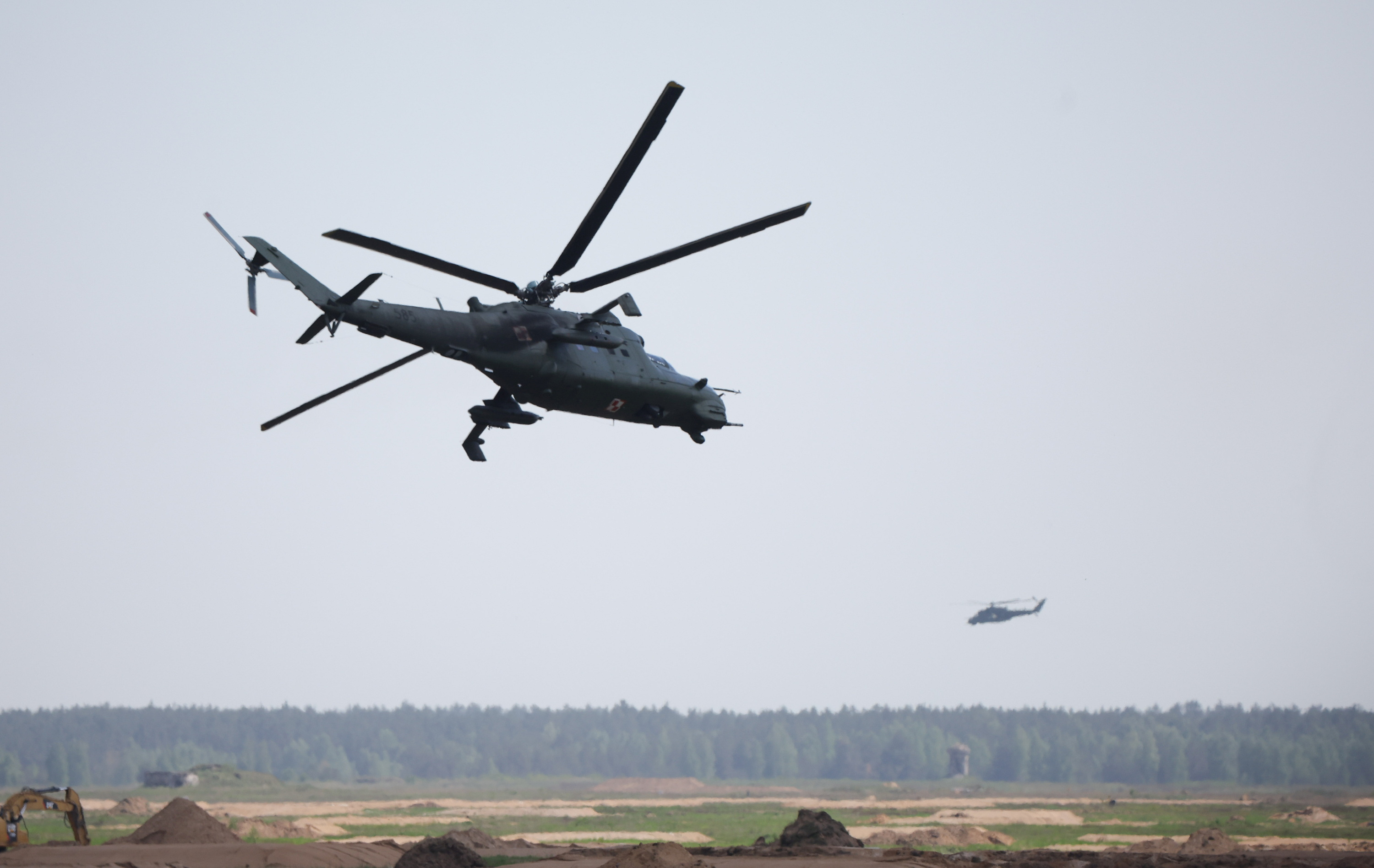 Polish Mi-24 helicopters flight during Defender Europe 2022 military exercise at the military range in Bemowo Piskie