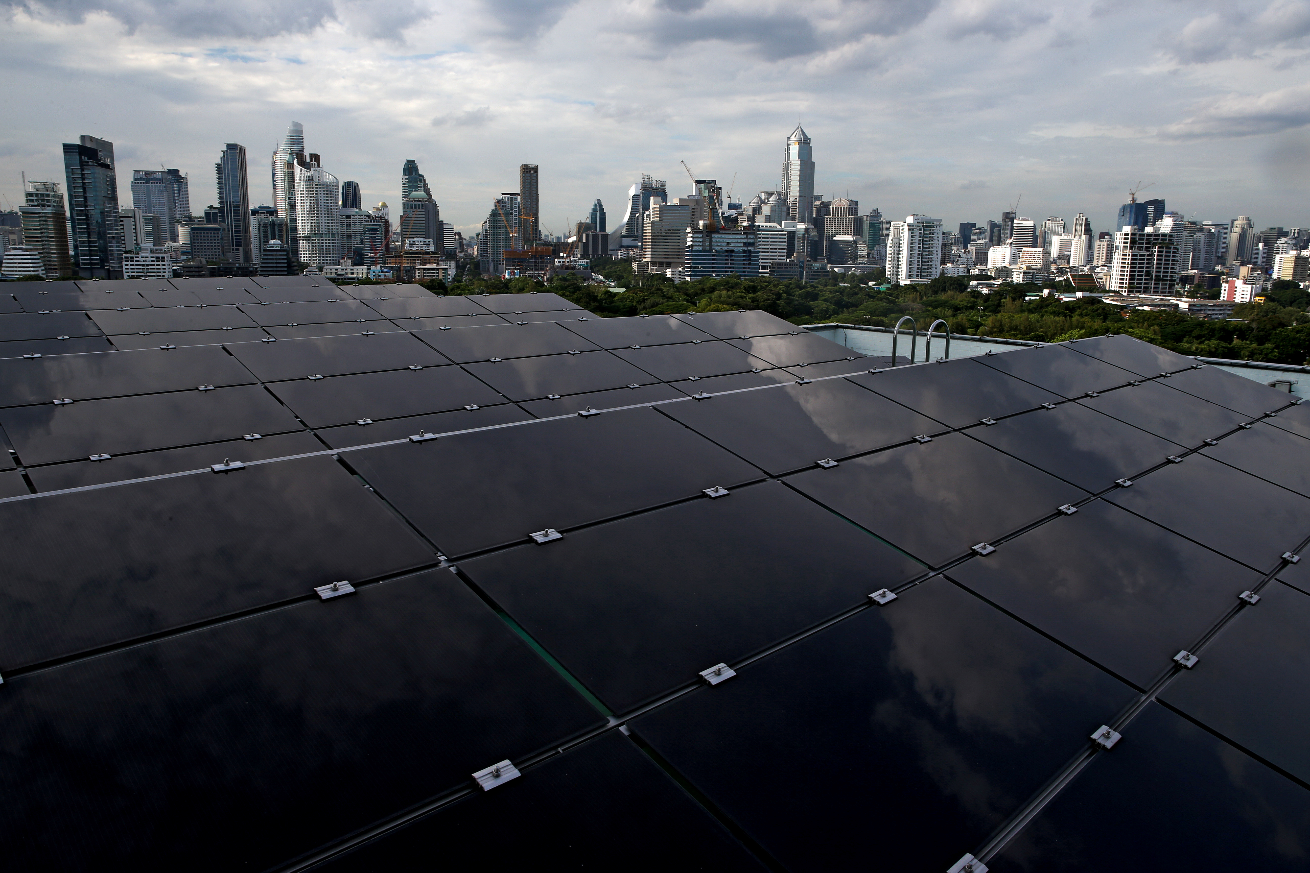Solar panels are pictured on the roof of a building in Bangkok
