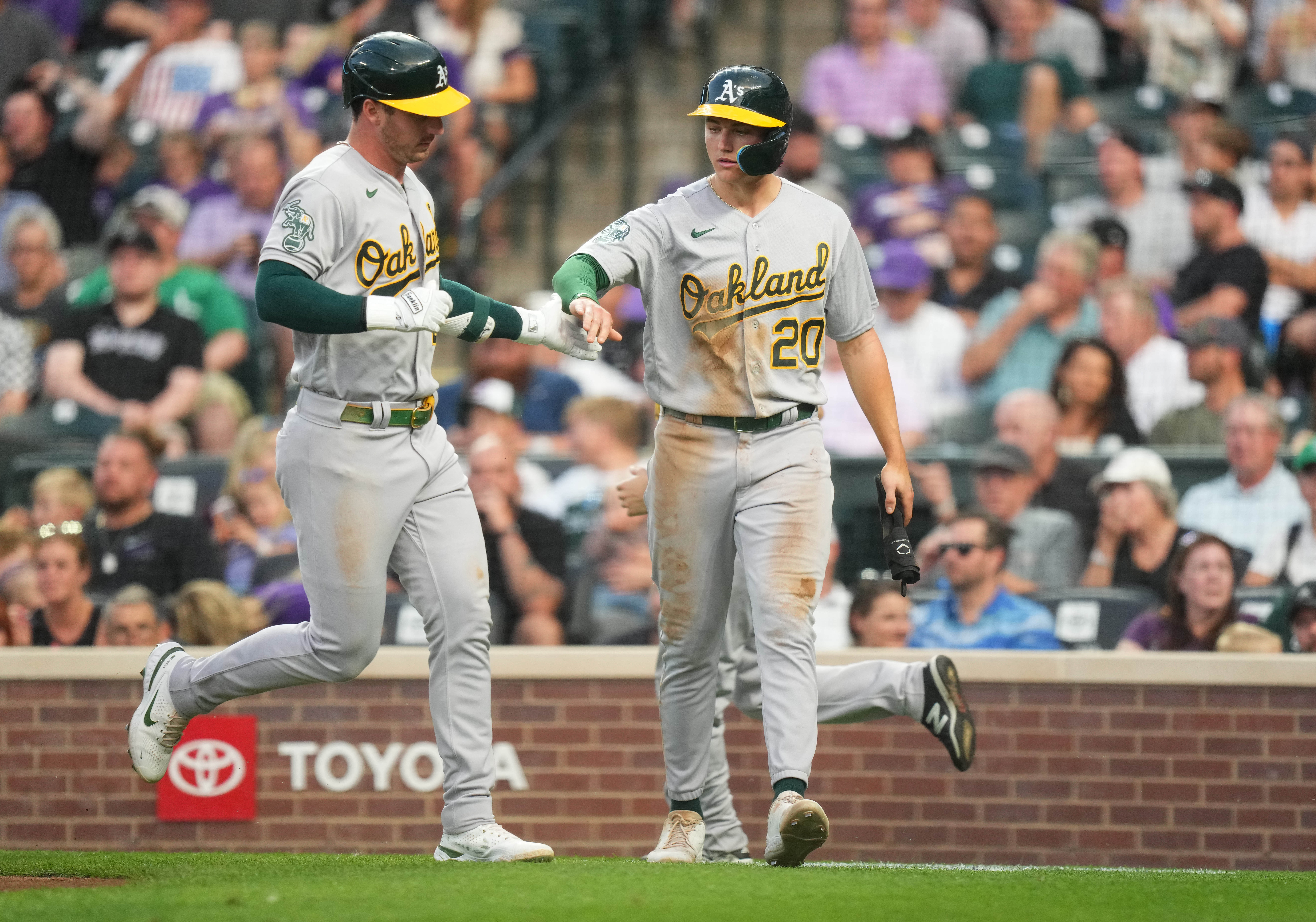 A's explode for 11 runs in walloping Rockies