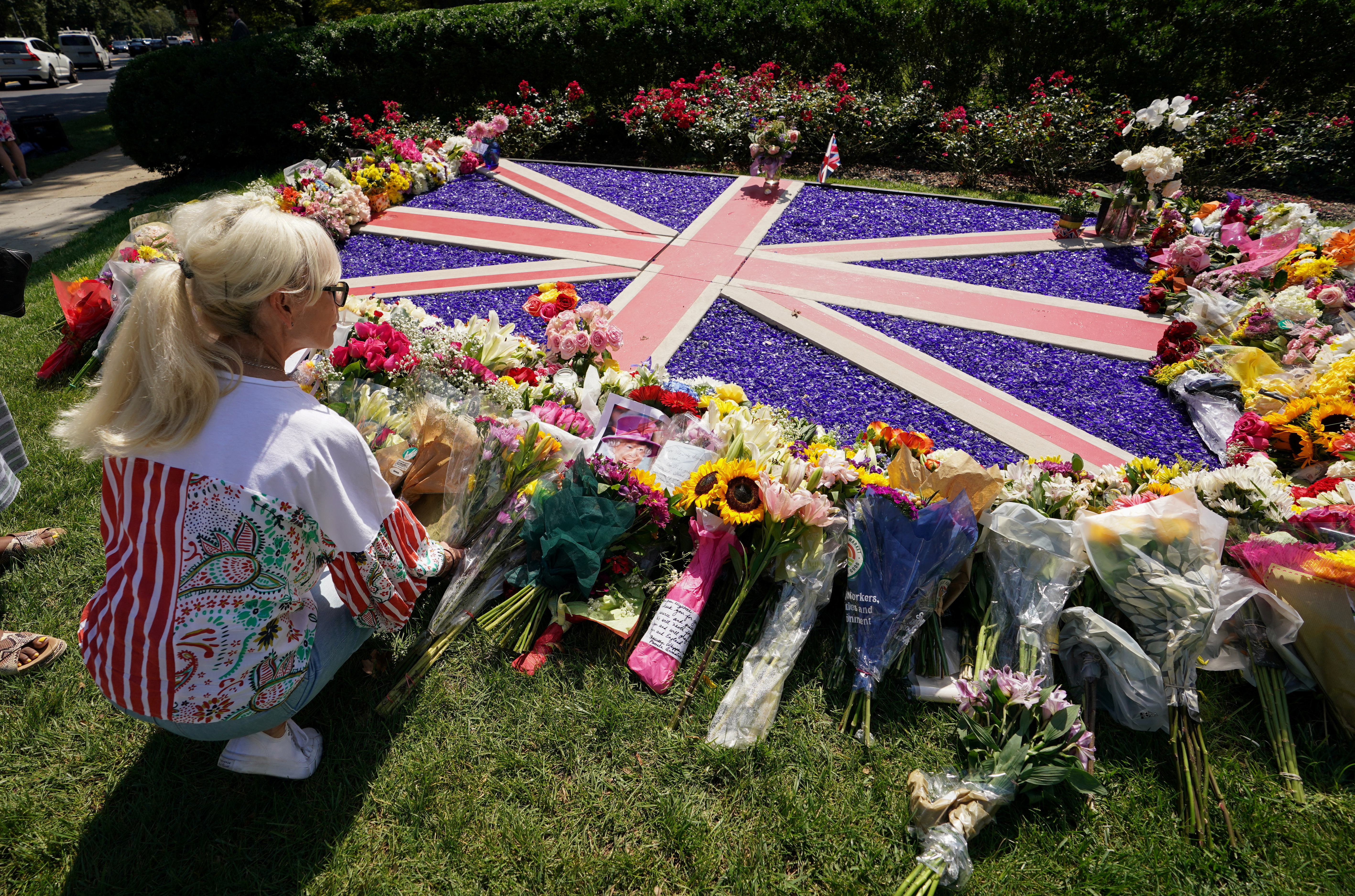 Mourners pay respects at the British Embassy in Washington