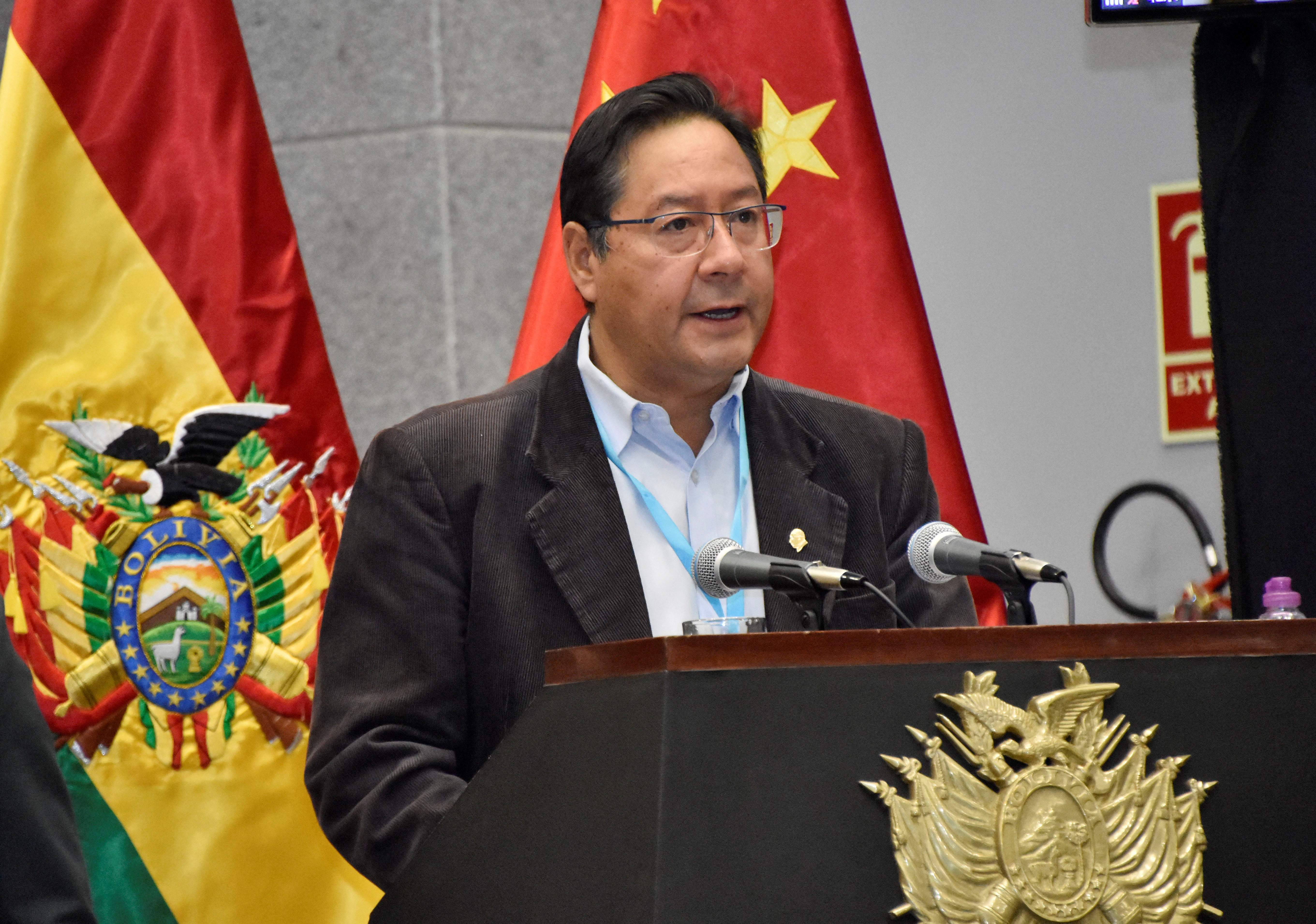 Bolivia's President Luis Arce speaks during a ceremony of the agreement with Chinese Sinopharm, locking in an initial supply of half a million doses of the company's vaccine against the coronavirus disease (COVID-19), at the Casa Grande del Pueblo palace In La Paz, Bolivia, February 11, 2021. Courtesy of Bolivian Presidency/Jorge Mamani/Handout via REUTERS 