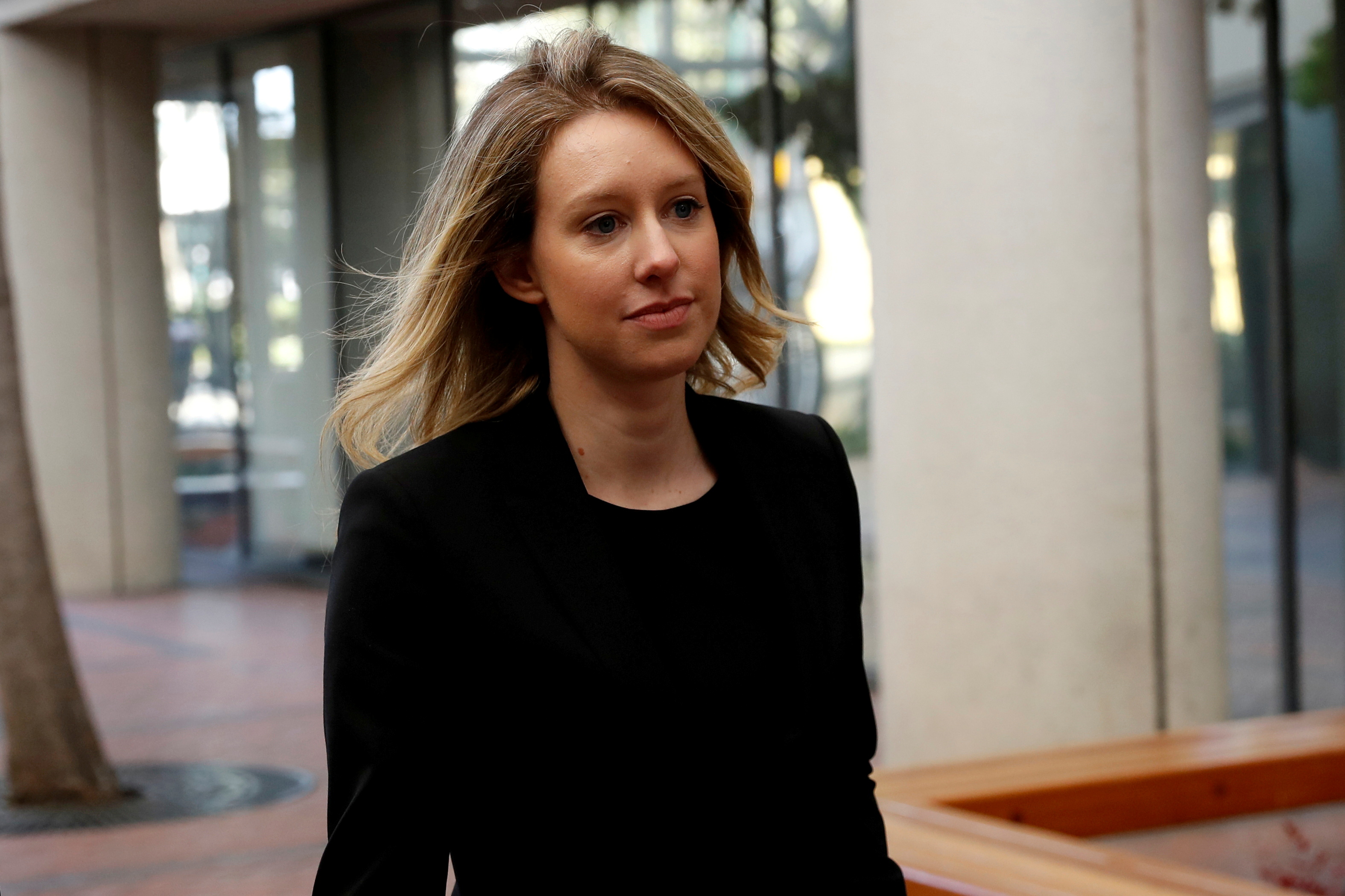 Former Theranos CEO Elizabeth Holmes arrives for a hearing at a federal court in San Jose