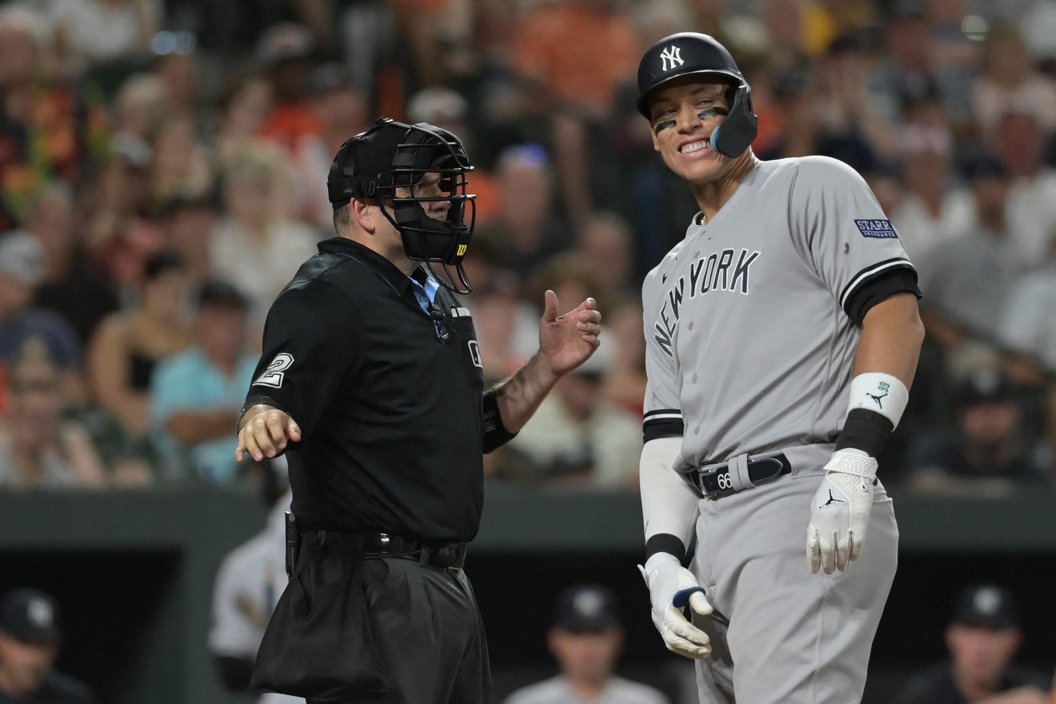 Dyersville, United States. 12th Aug, 2021. New York Yankees' Aaron Judge  (99) celebrates with Rougned Odor (12) after a three-run homer against the  Chicago White Sox during the third inning of the