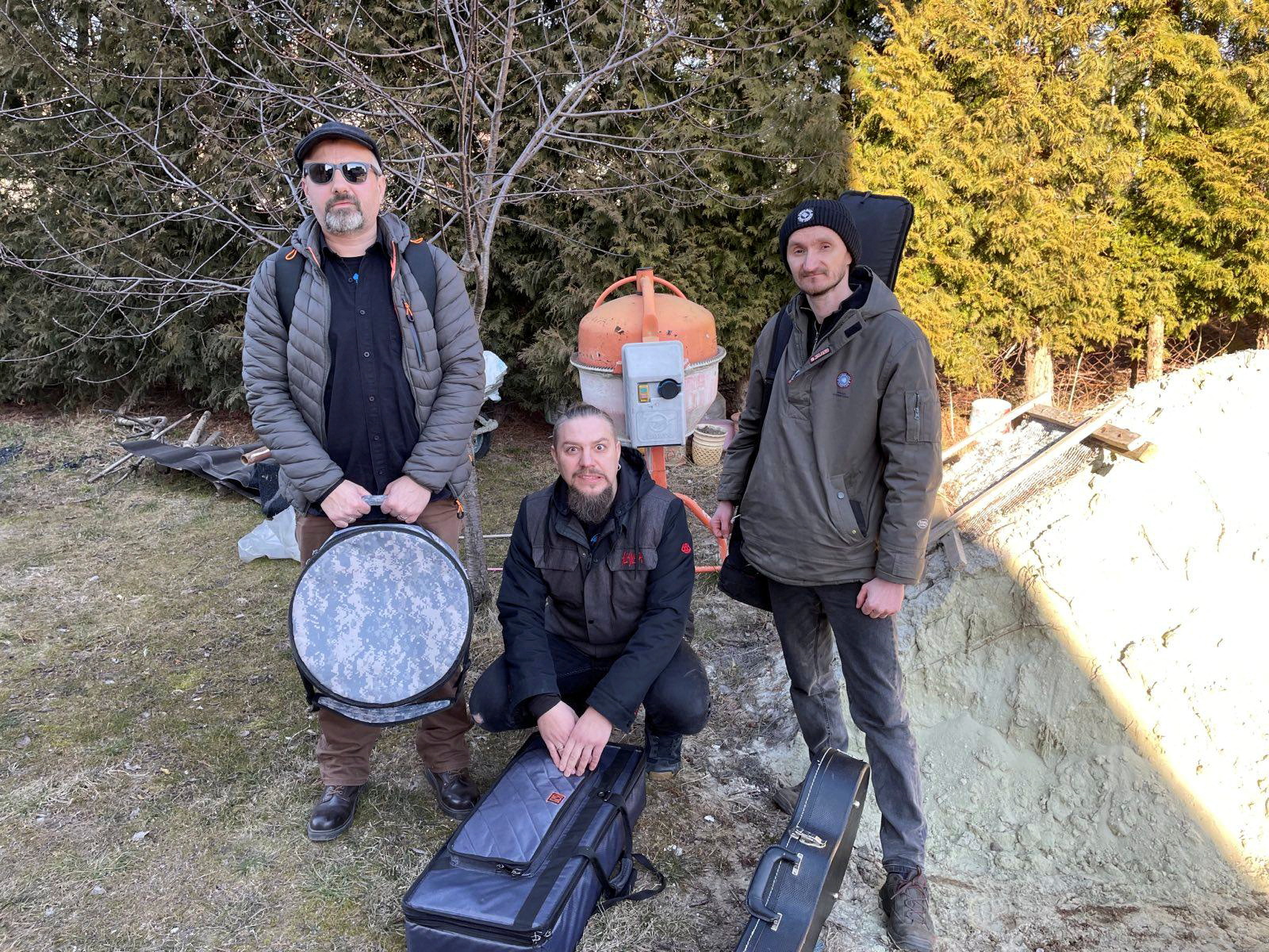 The members of the Ukrainian band Beton, Bohdan Hrynko, Andriy Zholob and Oleg Hula, pose for a picture while getting ready to go to a studio in Lviv to record their single Kyiv Calling