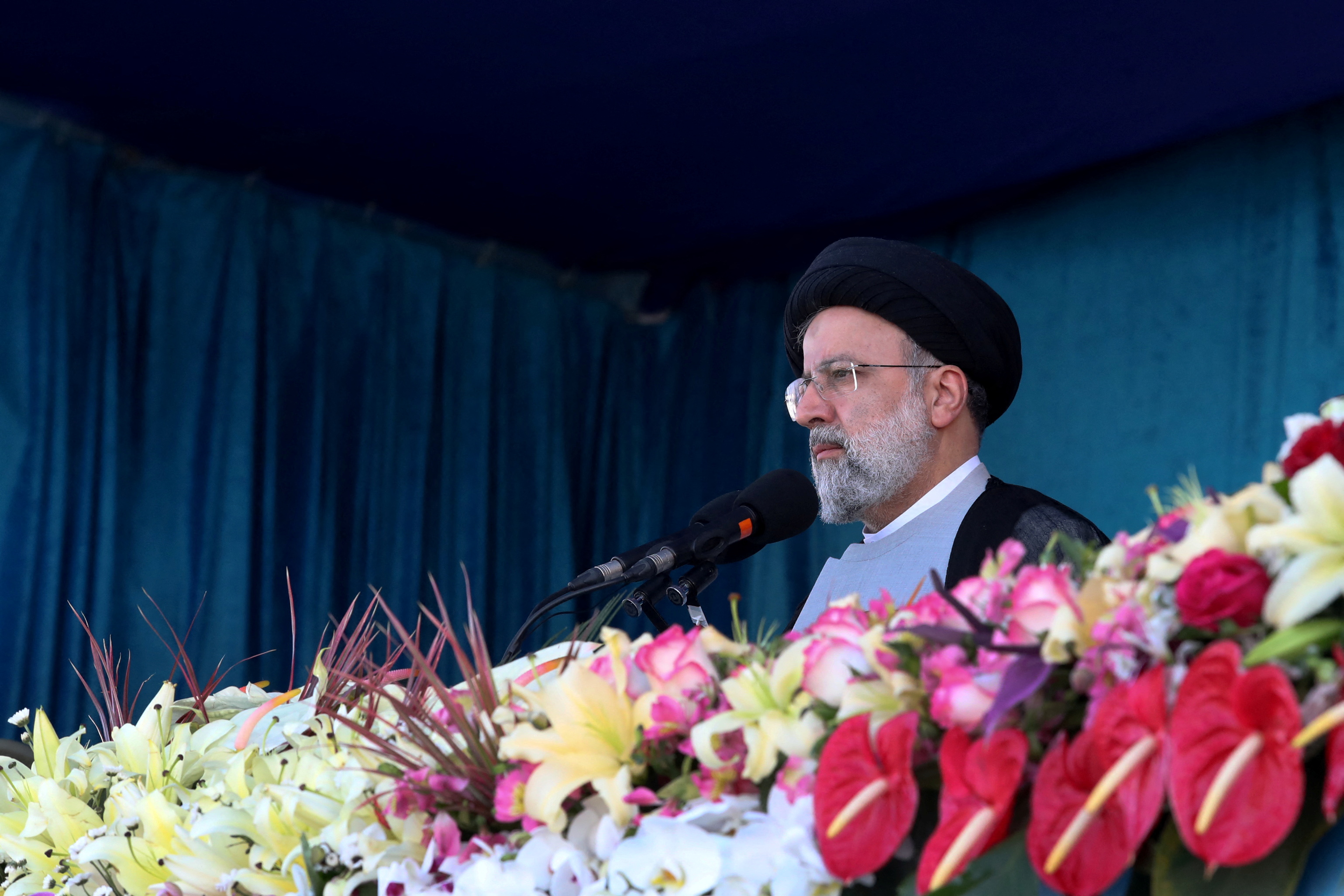 Iranian President Ebrahim Raisi delivers a speech during the ceremony of the National Army Day parade in Tehran