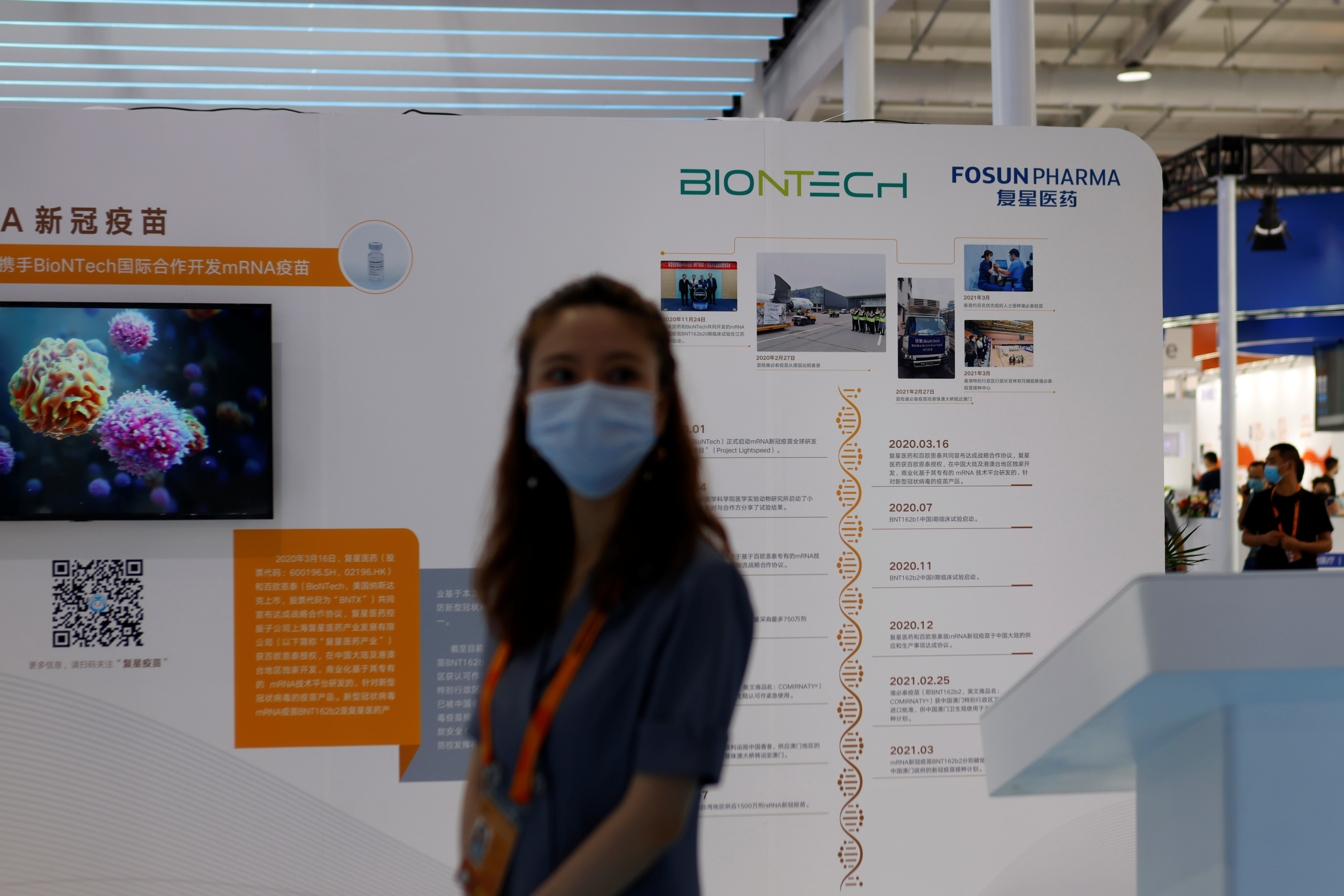 The BioNTech logo is seen at the booth of Fosun Pharmaceutical (Group) in Beijing