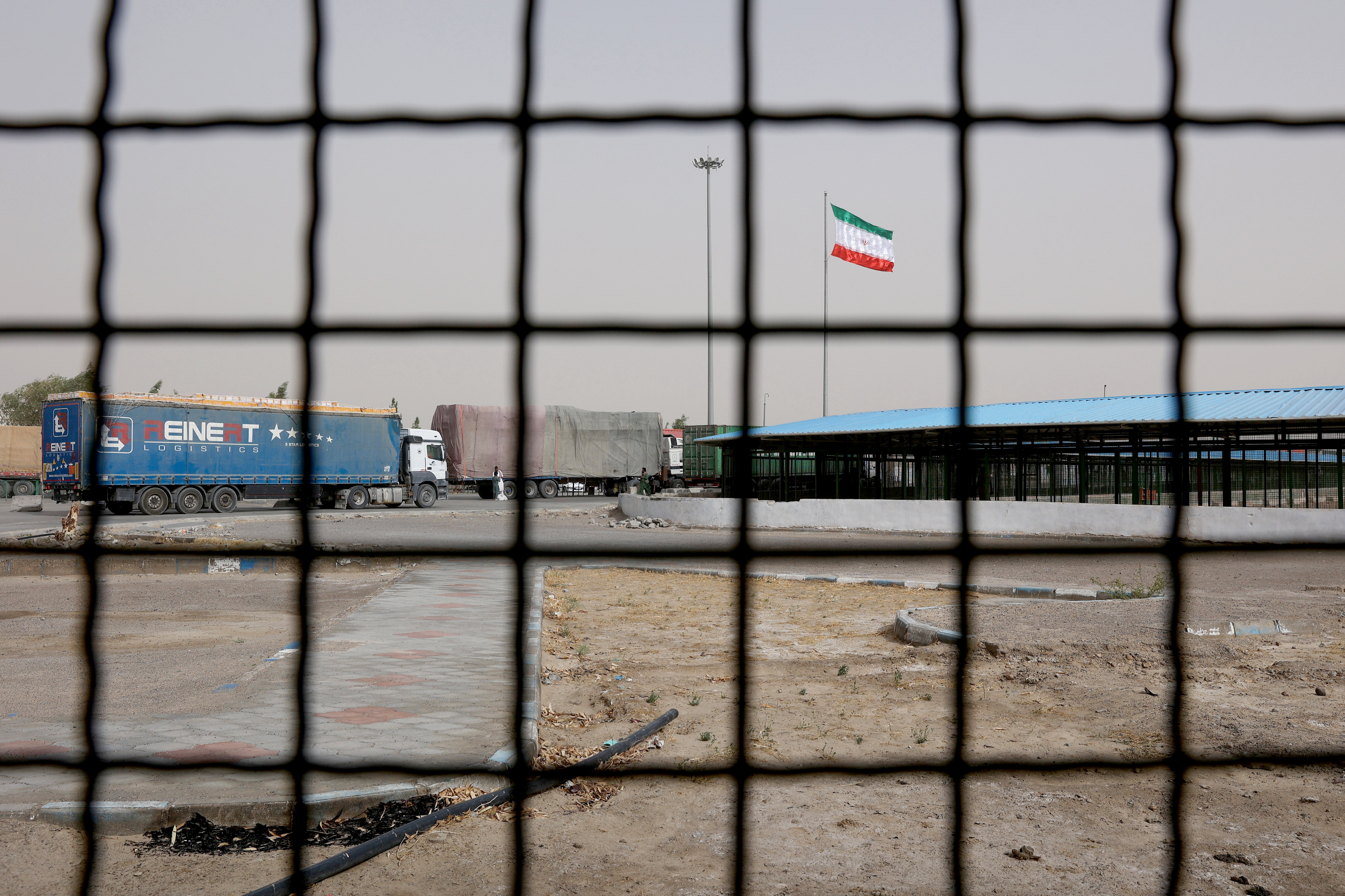 Iran's flag is pictured at the Milak border crossing between Iran and Afghanistan, Sistan and Baluchestan Province