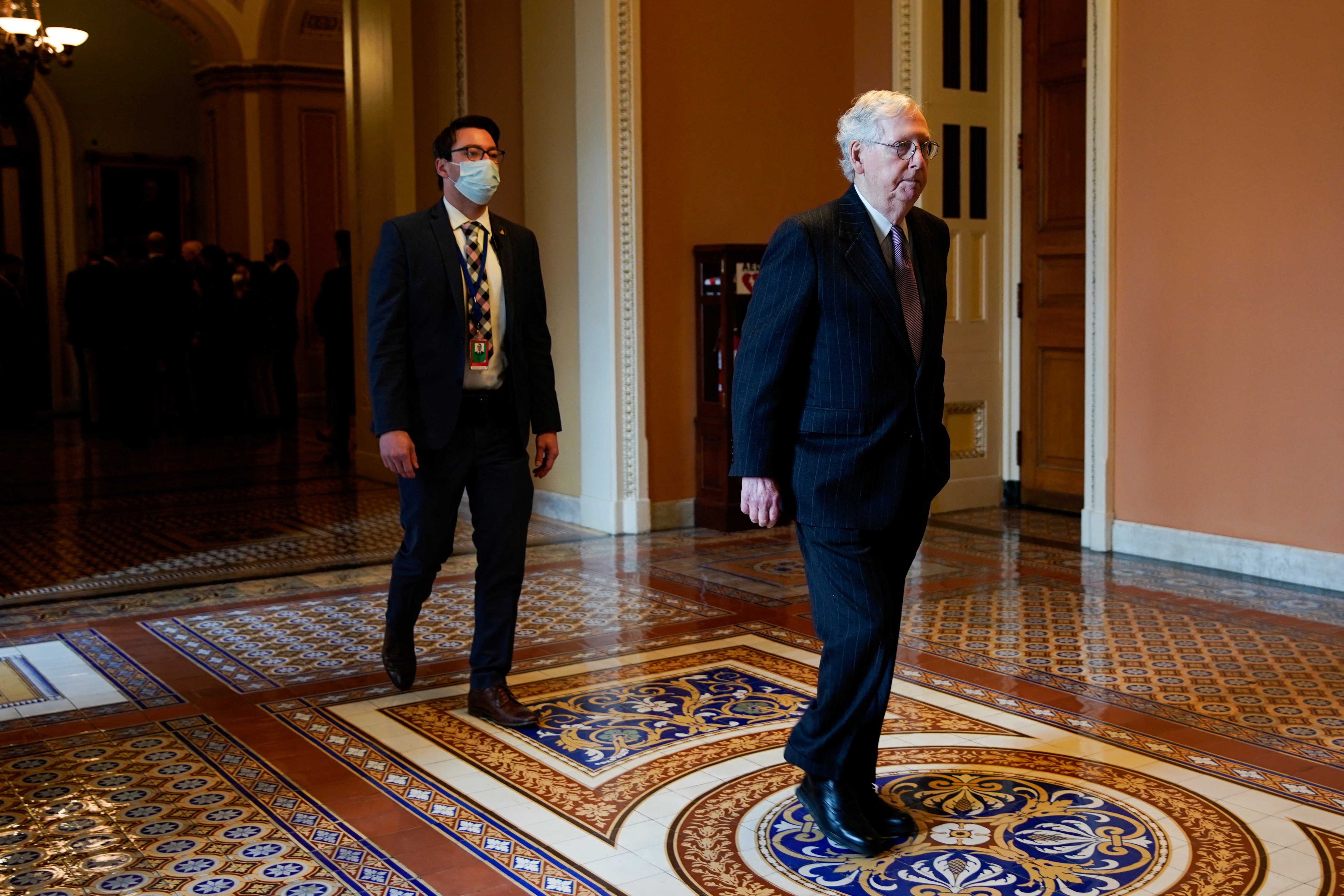 U.S. Senate Minority Leader Mitch McConnell (R-KY) walks back to his office at the U.S. Capitol in Washington