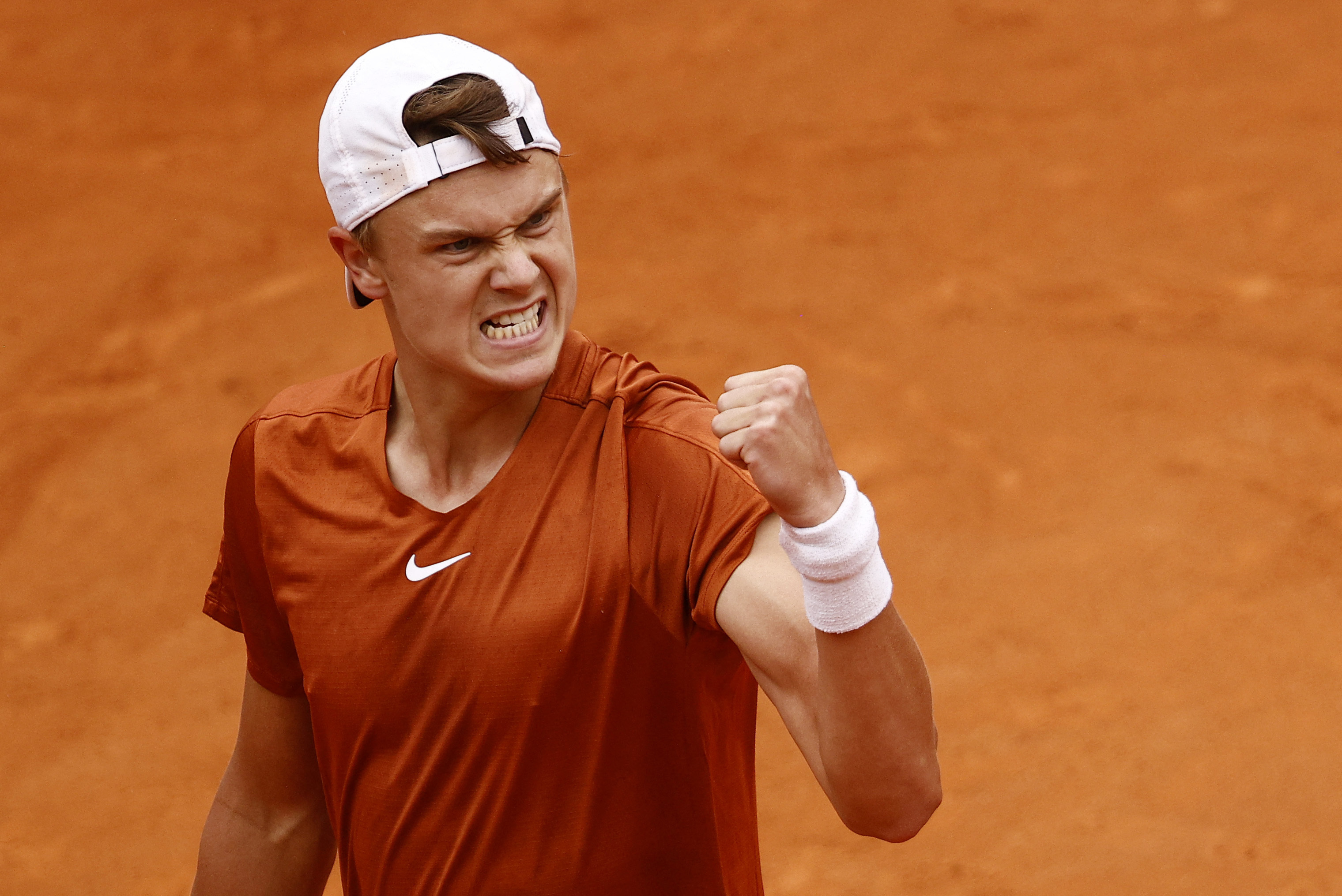 Denmark's Holger Rune celebrates after winning a semi final match against  Norway's Casper Ruud at the Italian Open tennis tournament in Rome, Italy,  Saturday, May 20, 2023. (AP Photo/Alessandra Tarantino Stock Photo 