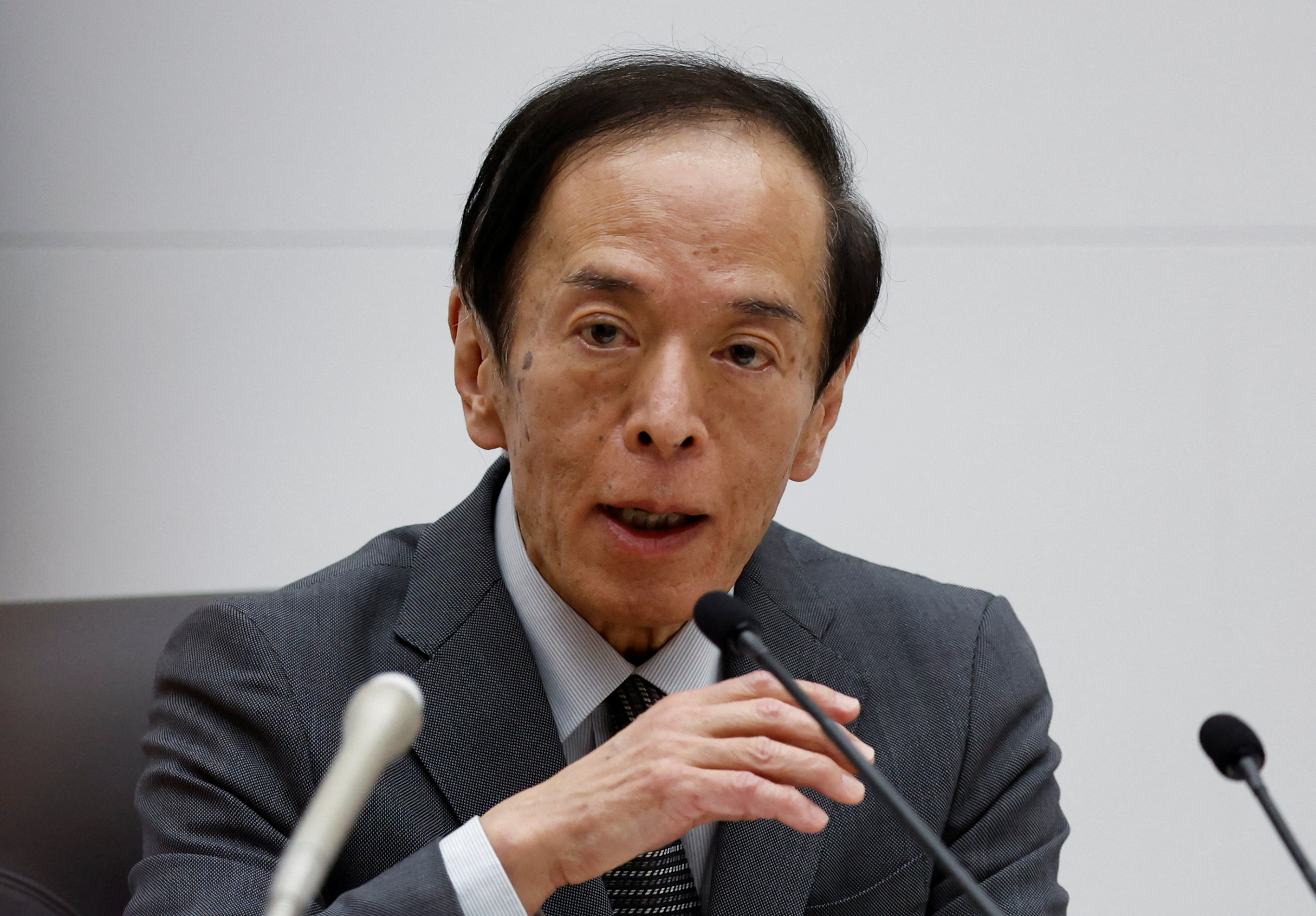 Bank of Japan Governor Kazuo Ueda attends a news conference in Tokyo