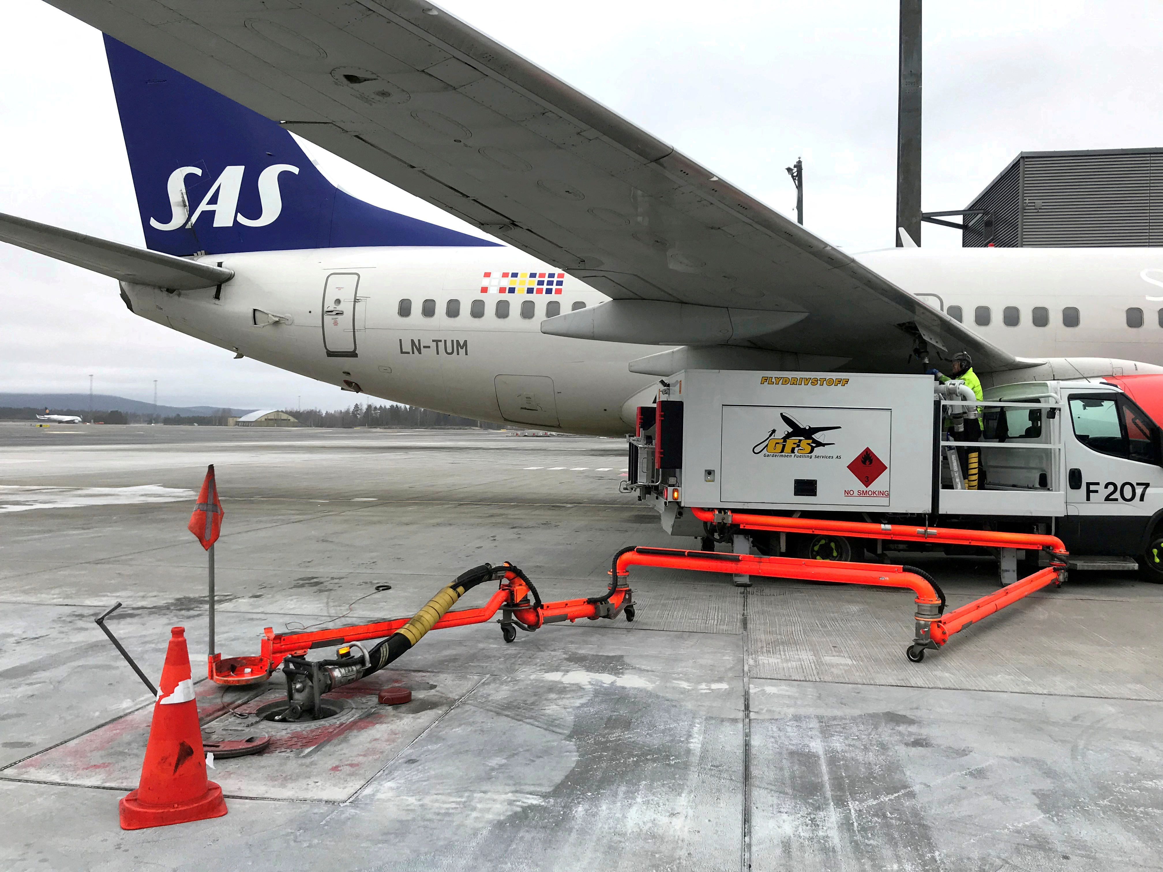 A Scandinavian Airlines (SAS) plane is refuelled at Oslo Gardermoen airport