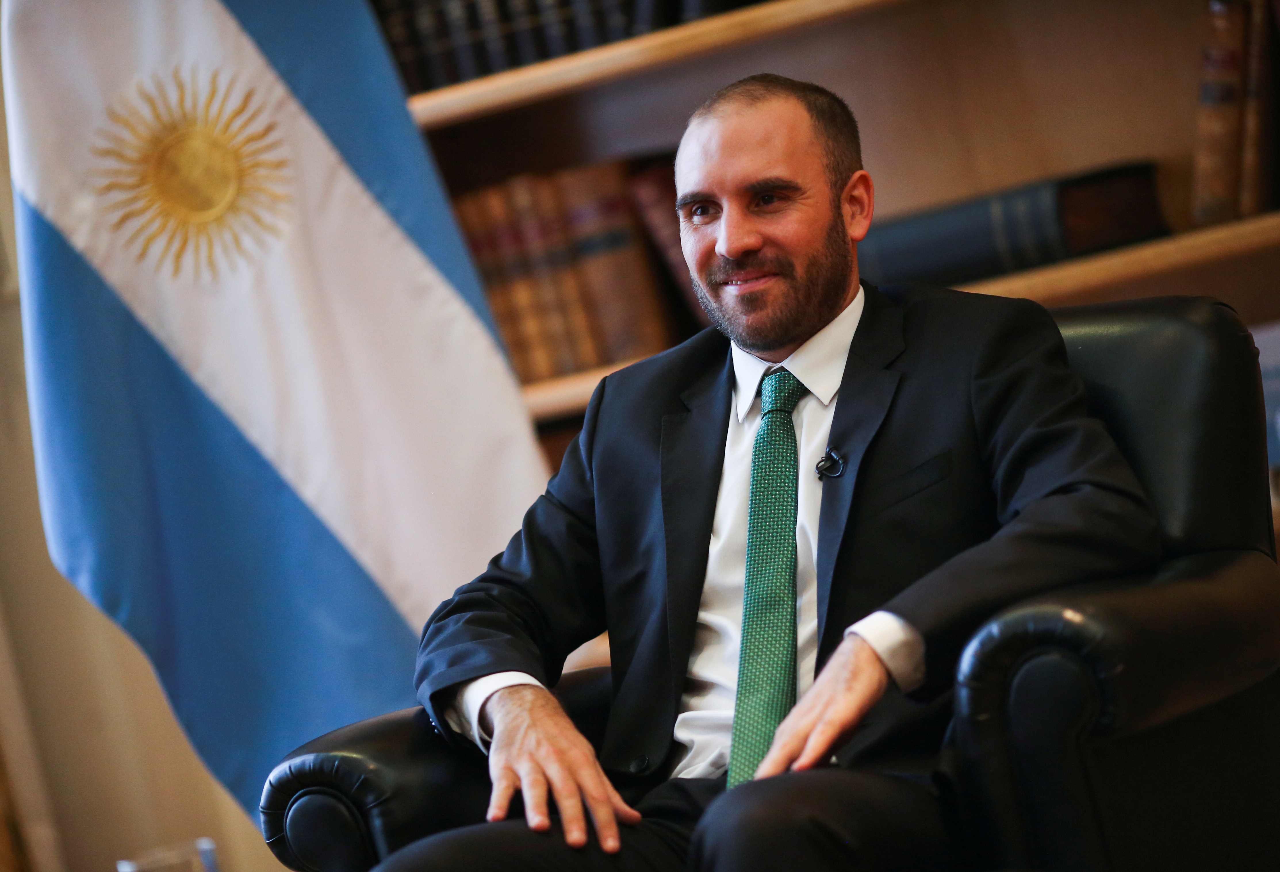 Argentina's Economy Minister Martin Guzman poses for a picture before an interview with Reuters at the Economy Ministry, in Buenos Aires