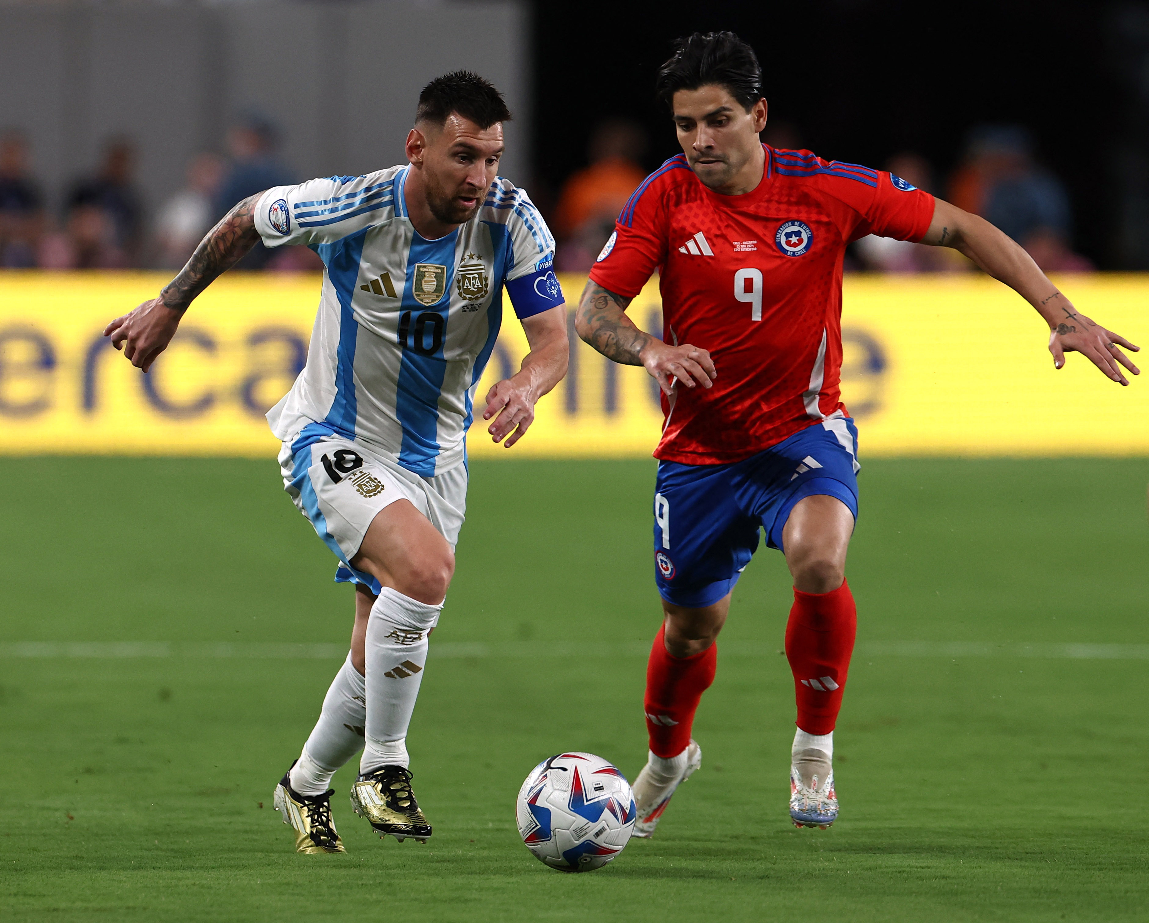 Argentina edge Chile 10 to seal Copa America quarterfinal place Reuters