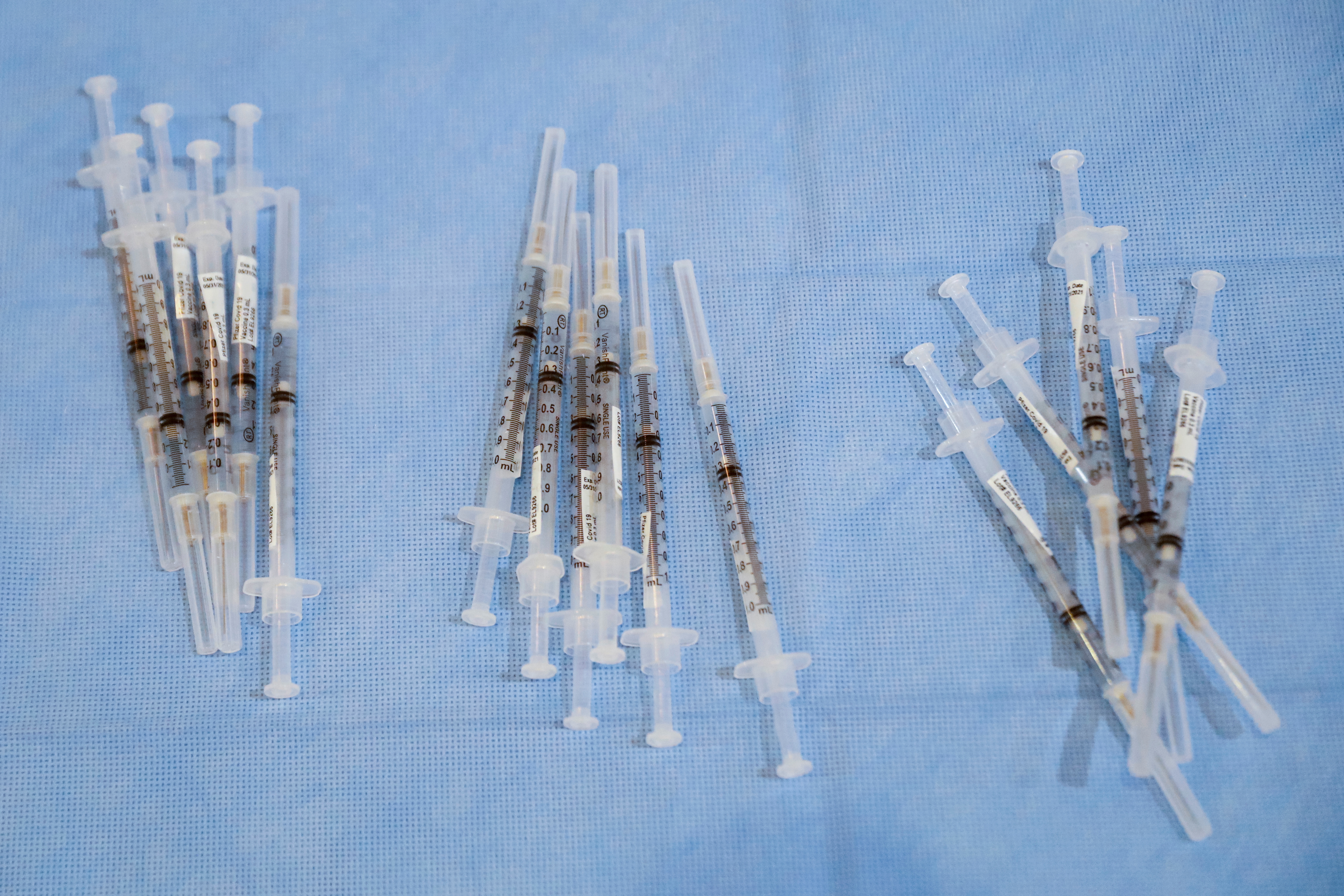 Syringes filled with a doses of Pfizer's coronavirus disease (COVID-19) vaccine are seen at a pop-up community vaccination center at the Gateway World Christian Center in Valley Stream, New York, U.S., February 23, 2021.  REUTERS/Brendan McDermid
