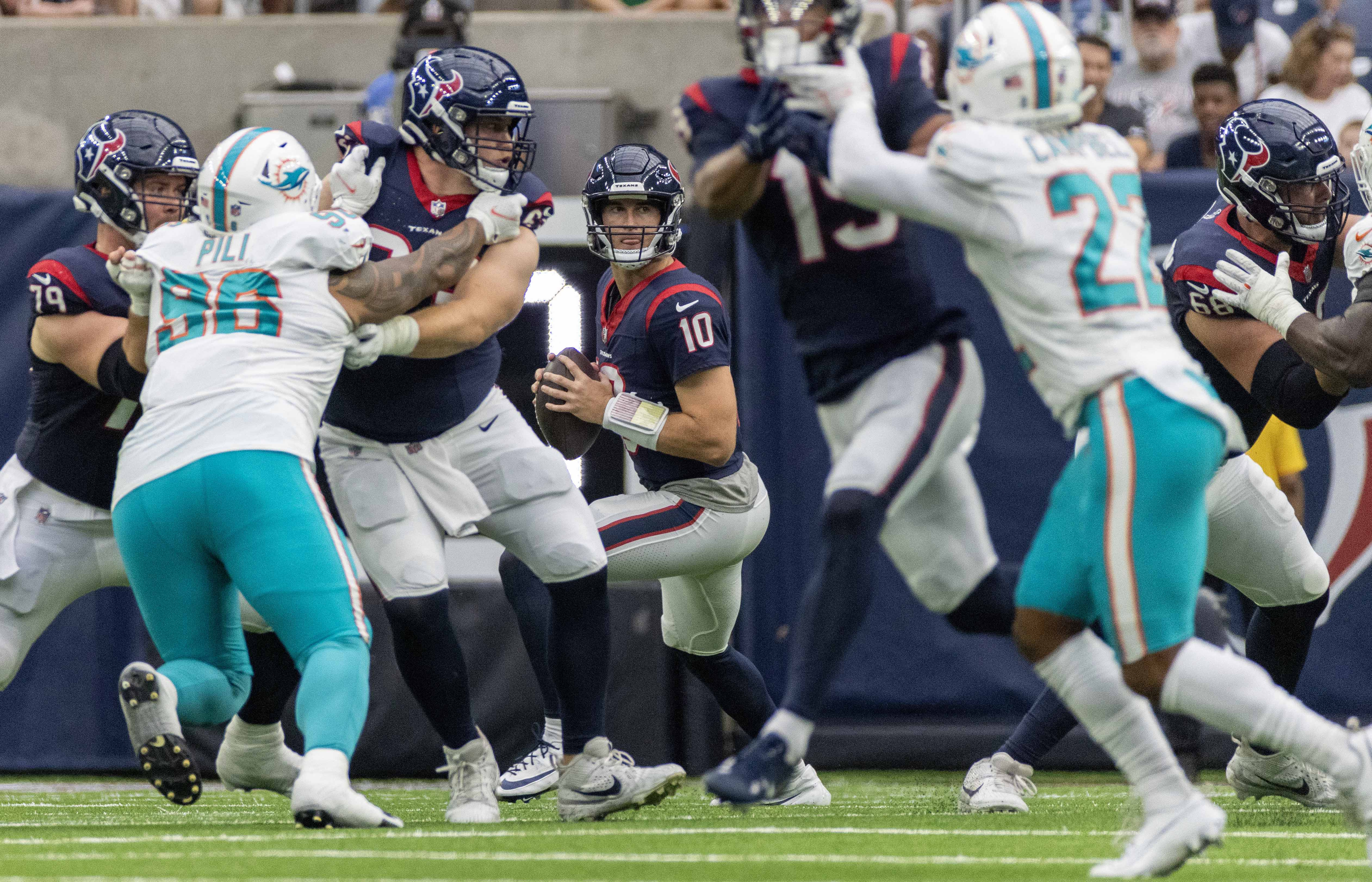 Miami. FL USA; Miami Dolphins quarterback Skylar Thompson (19) rolls out of  the pocket during an NFL game against the Houston Texans at the Hard Rock  Stadium, Sunday, November 27. The Dolphins