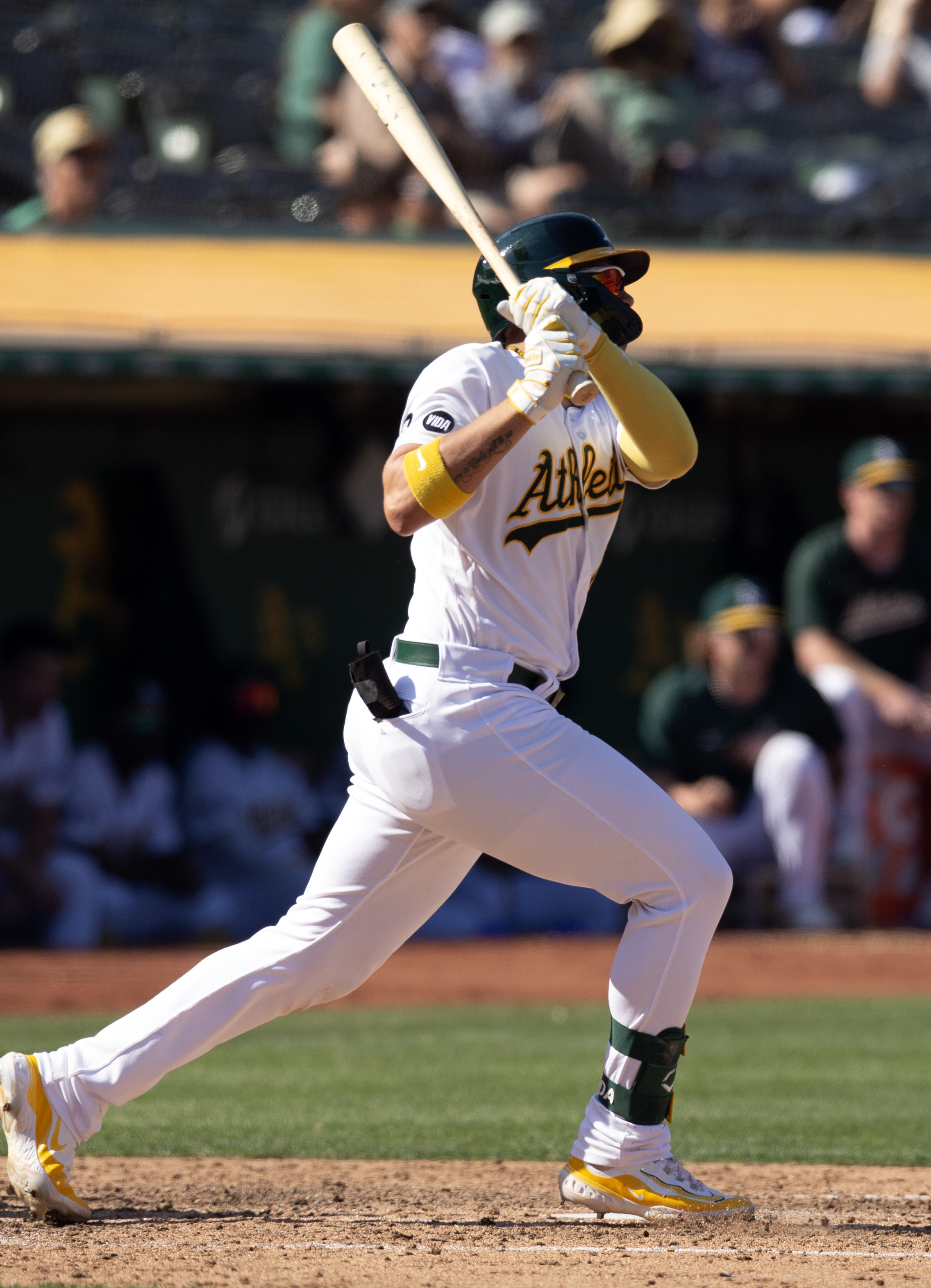 A's snuff out late-inning threats, defeat Tigers