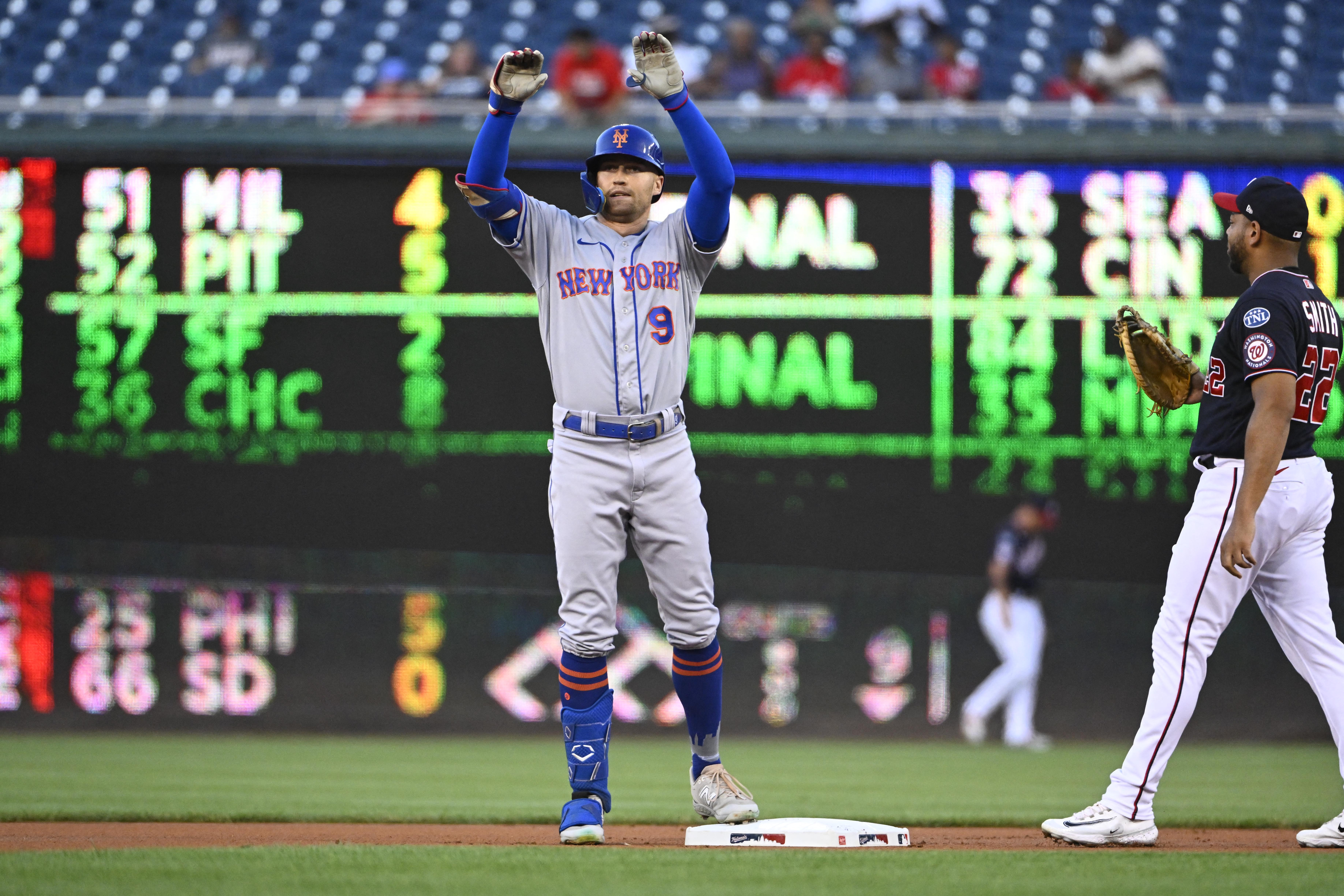 Rookie Jacob Young's single concludes the Nationals' rally for a 3-2 win  over the Mets