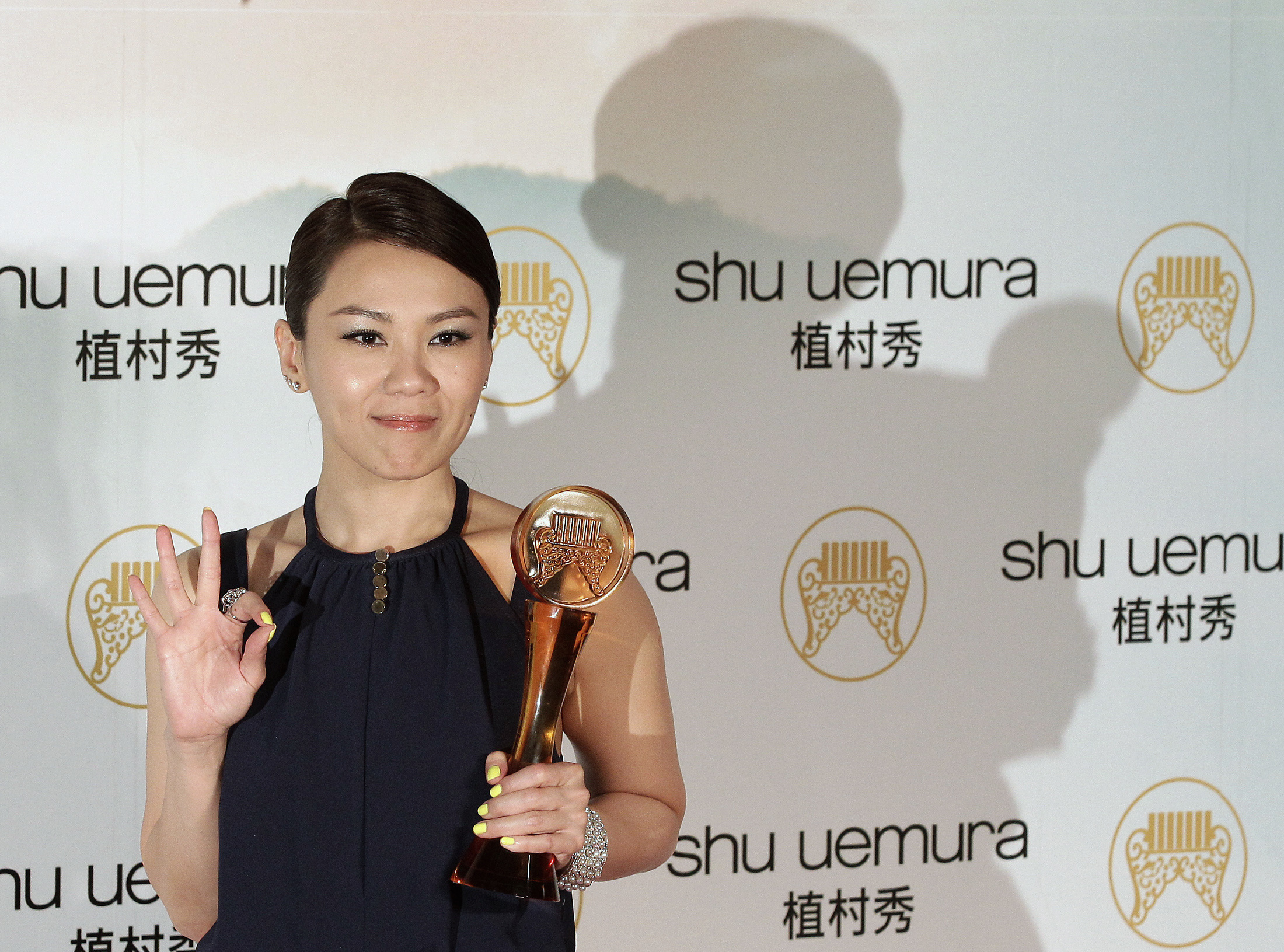 Singer Tanya Chua of Singapore poses after winning the Best Female Artist in Mandarin category at the 23rd Golden Melody Awards in Taipei