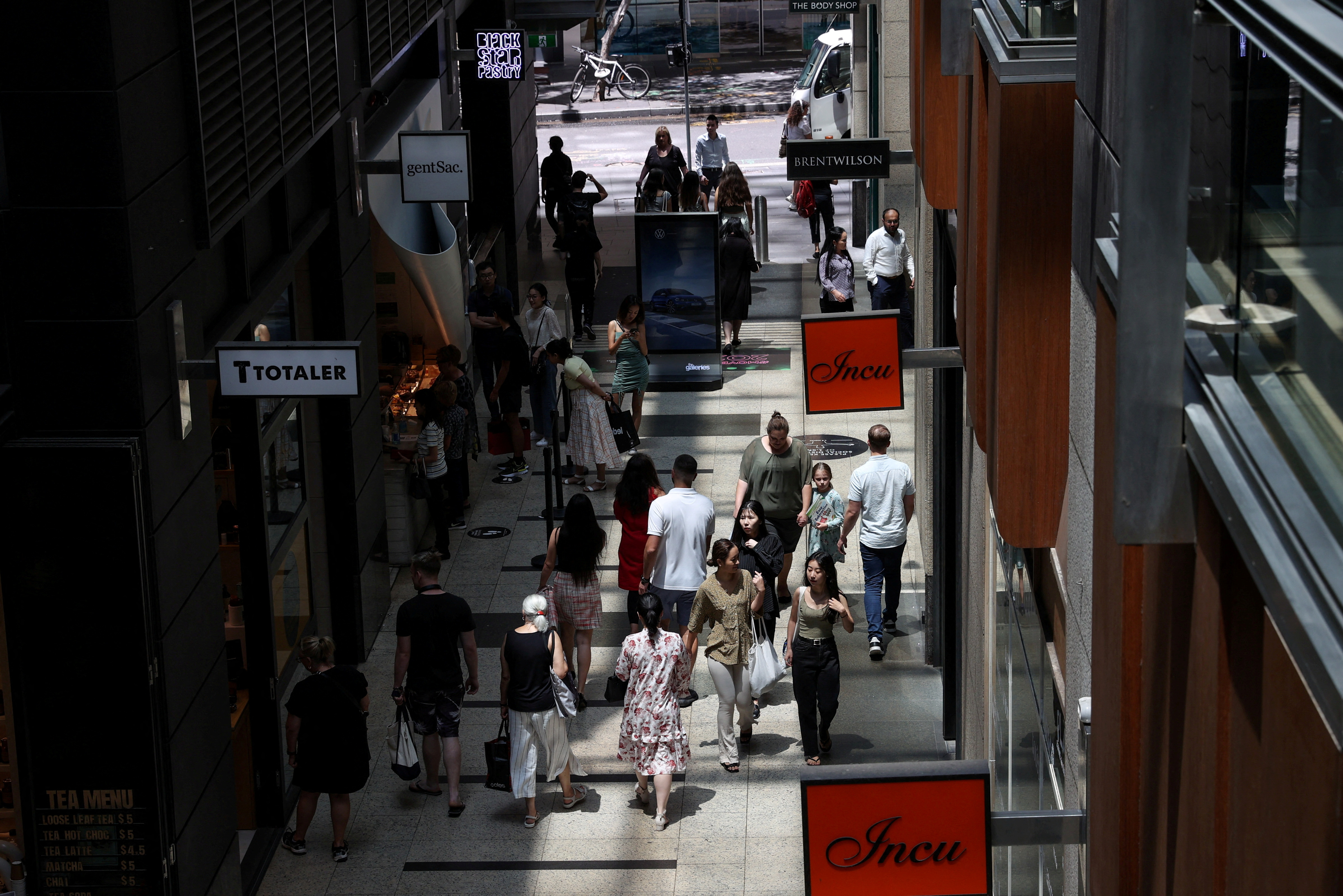 Holiday shoppers are seen in a mall in the city centre of Sydney