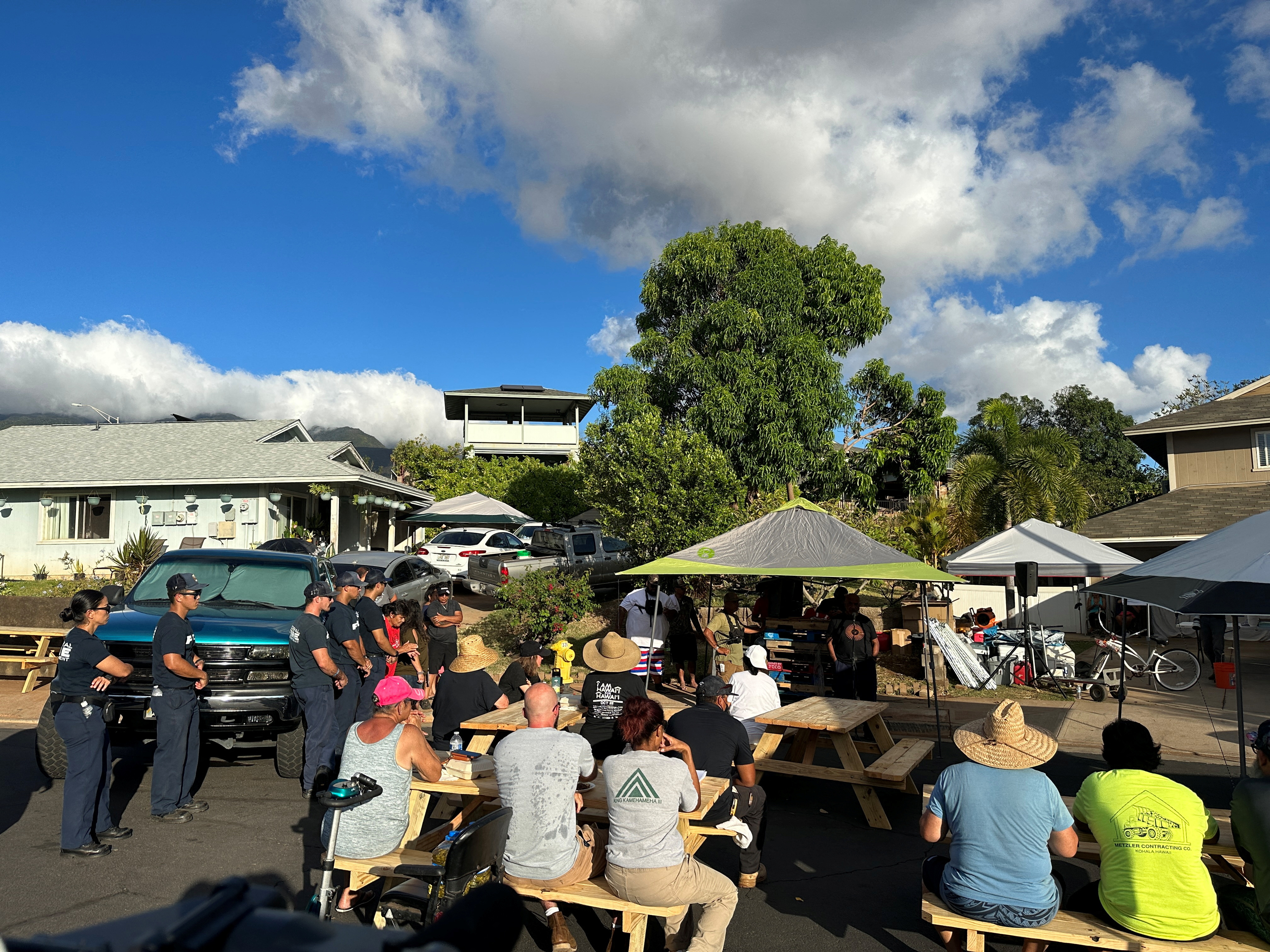 Local survivors of the Lahaina wildfire gather for a community dinner in Lahaina on the island of Maui