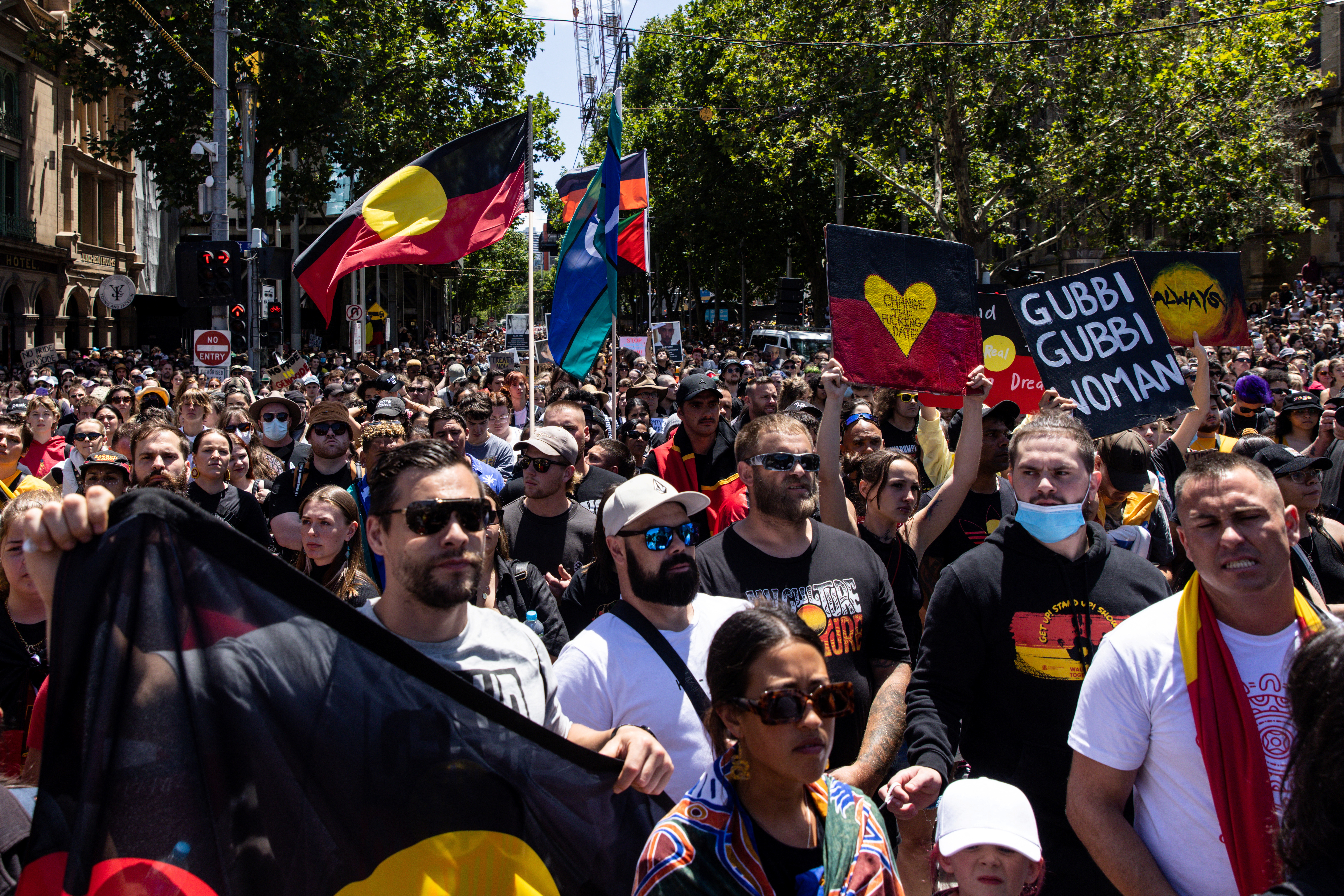 People take part in the 'Invasion Day' rally in Melbourne