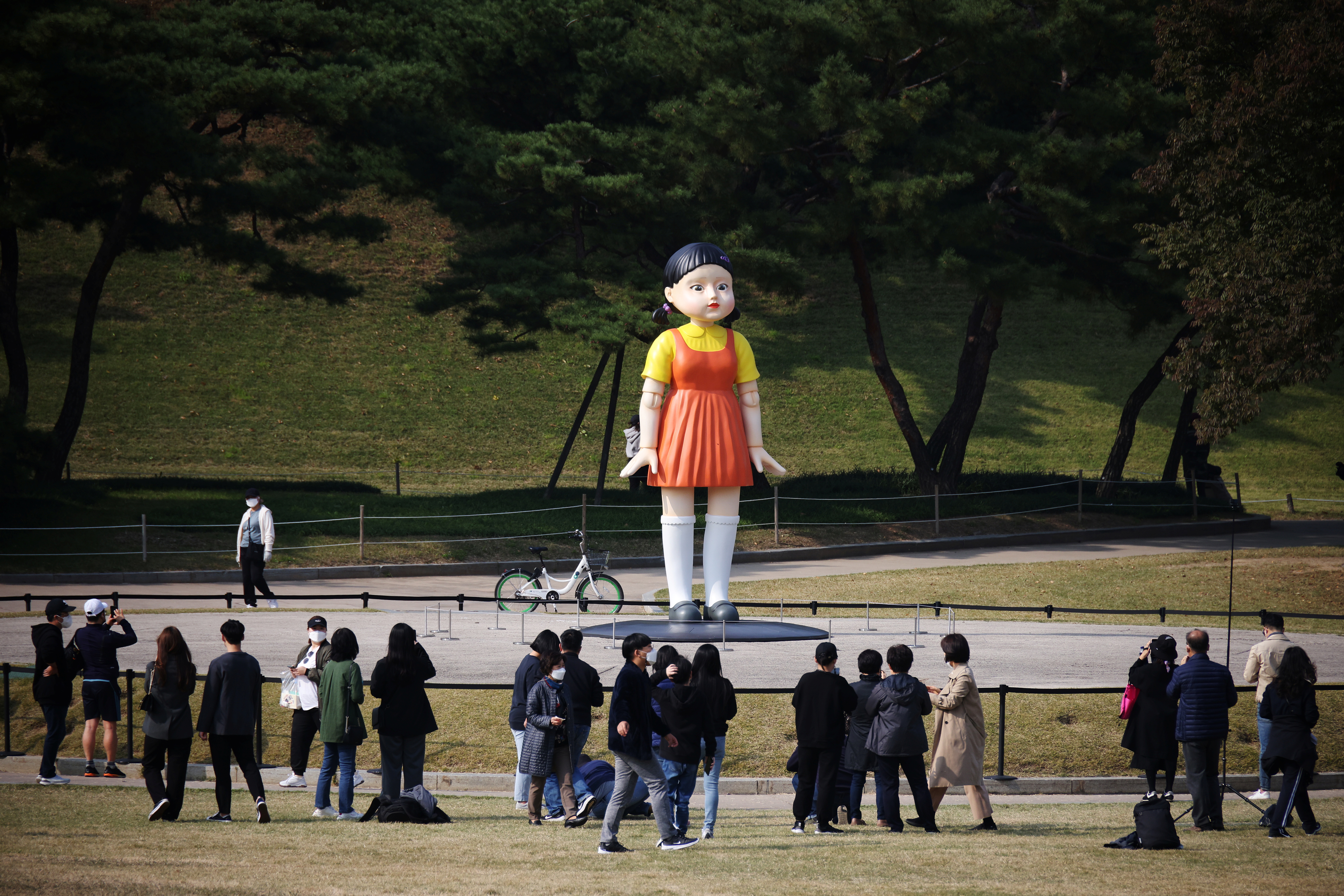 A giant doll named 'Younghee' from Netflix series 'Squid Game' is on display at a park in Seoul