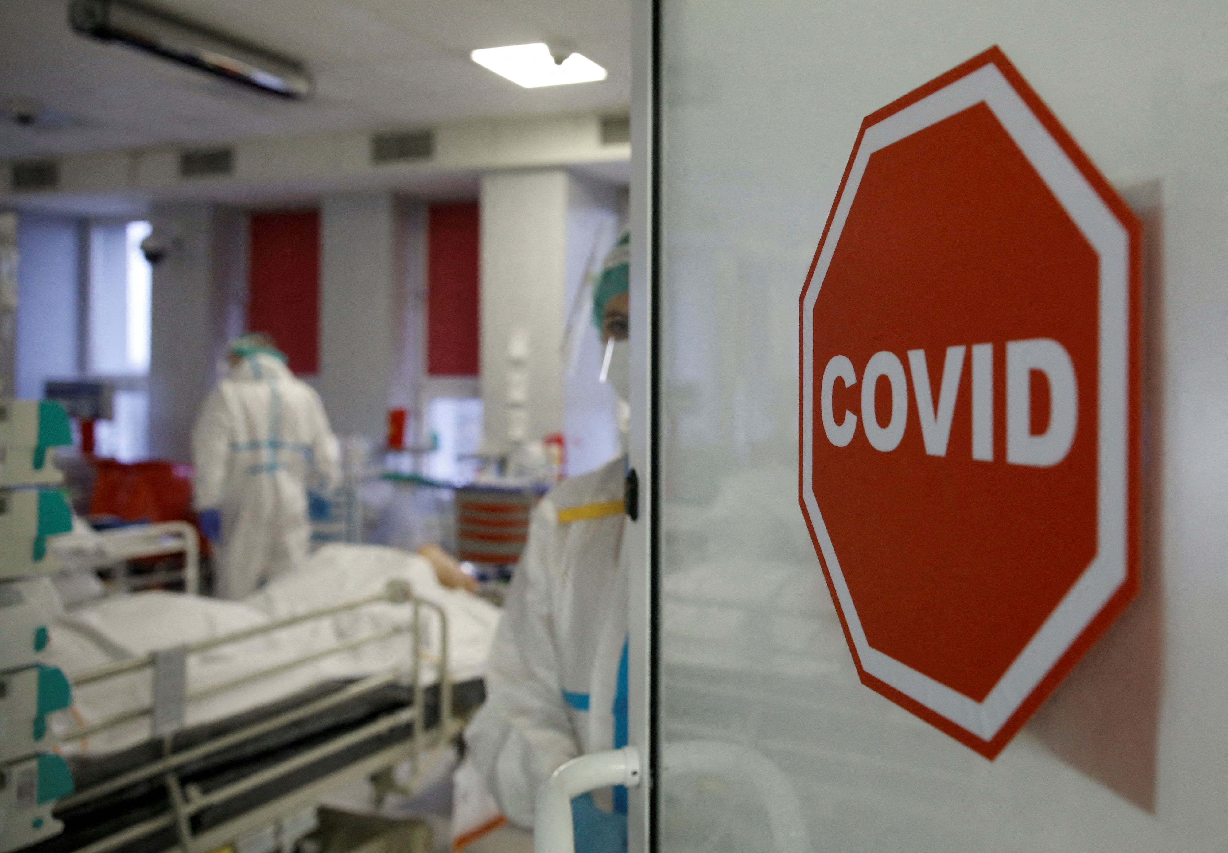 Medical staff members treat patients inside the coronavirus disease (COVID-19) ward at the Interior Ministry Hospital in Warsaw