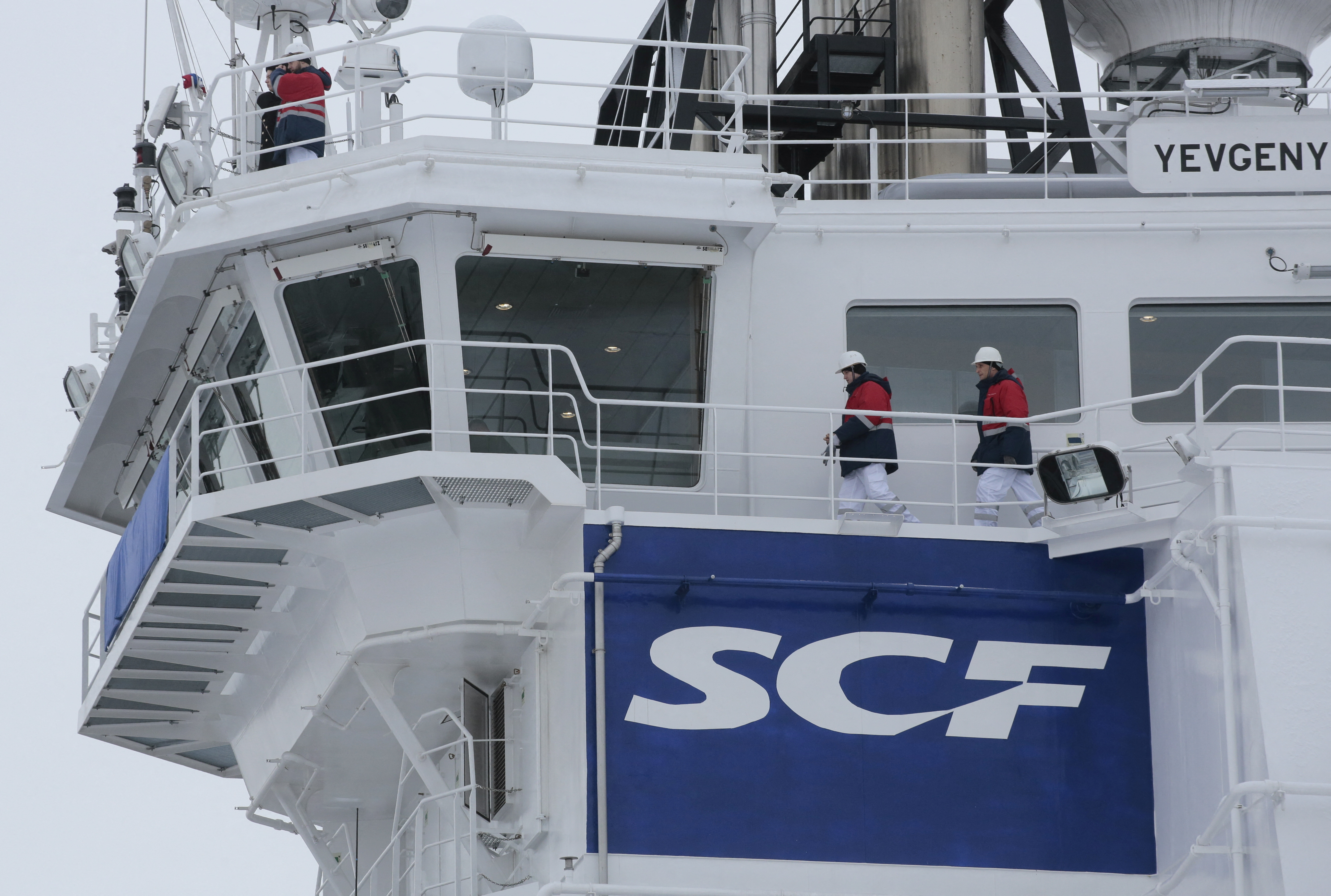 The logo of Russian state shipping company Sovcomflot is seen on the multifunctional icebreaking standby vessel "Yevgeny Primakov" moored in central St. Petersburg
