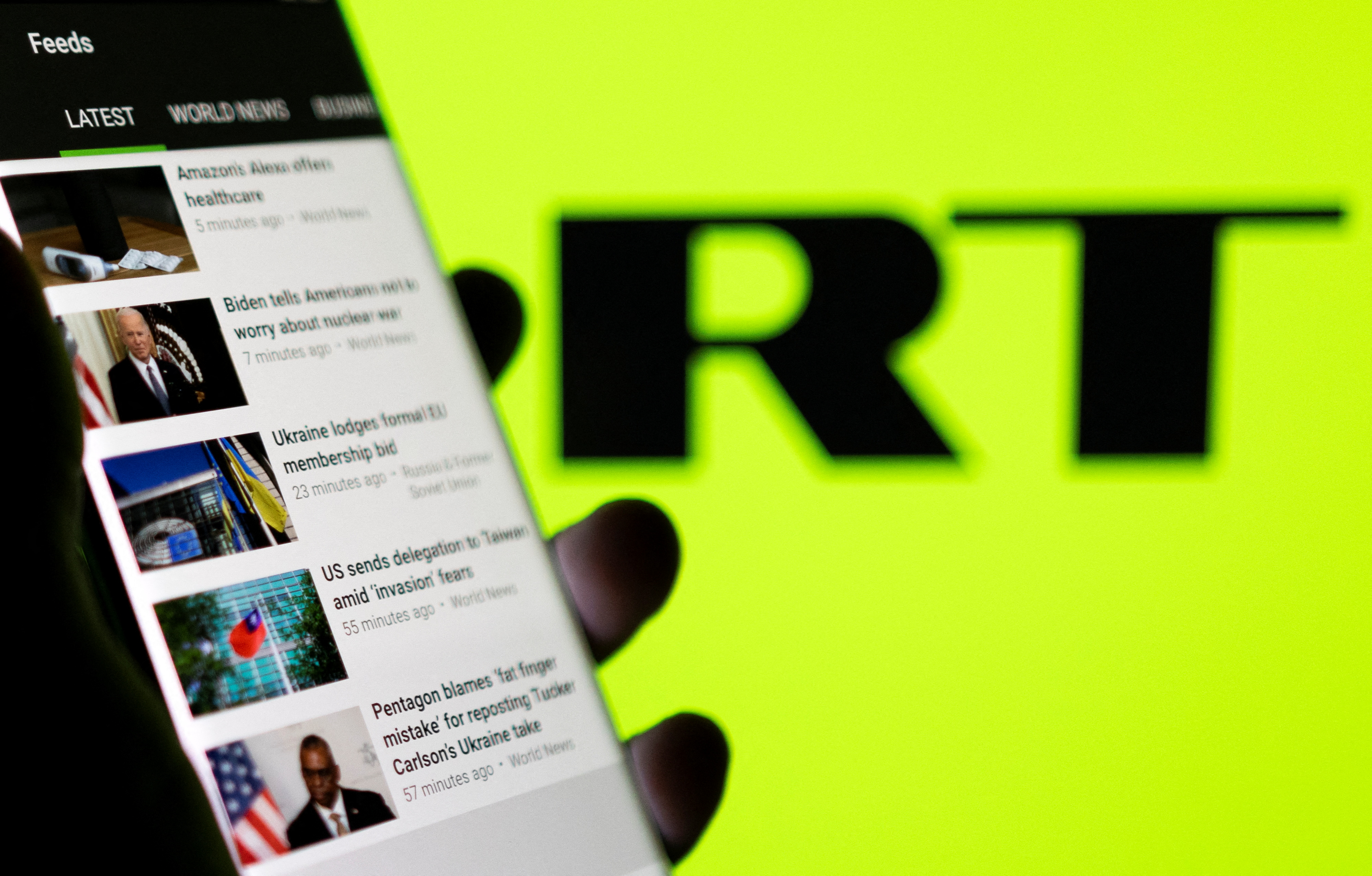 EU bans RT, Sputnik over disinformation | Reuters