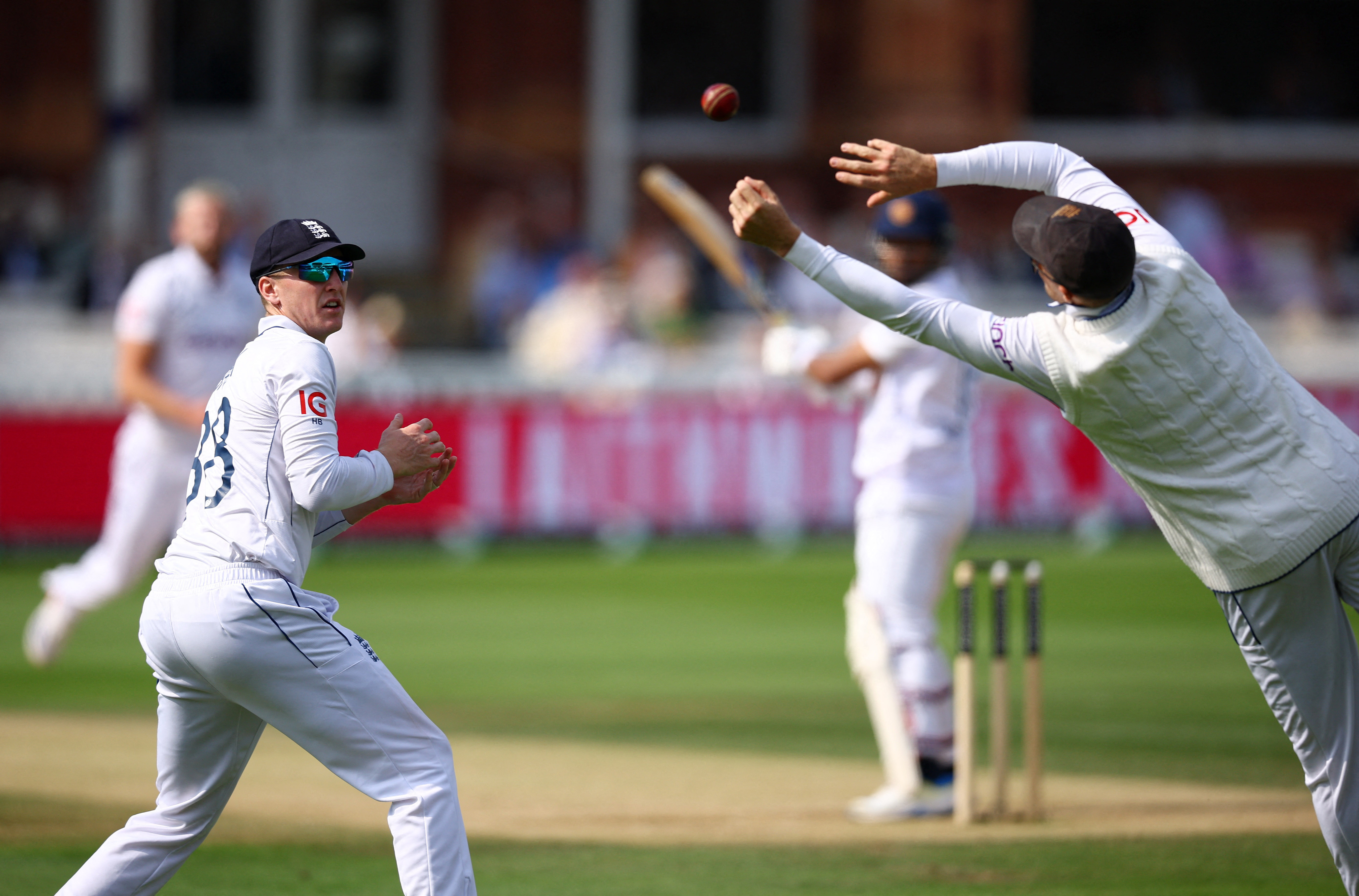 Cricket - Second Test - England v Sri Lanka - Lord's Cricket Ground, London, Britain - September 1, 2024 England's Joe Root drops the catch of Sri Lanka's Dimuth Karunaratne as Harry Brook looks on Action Images via Reuters/Andrew Boyers