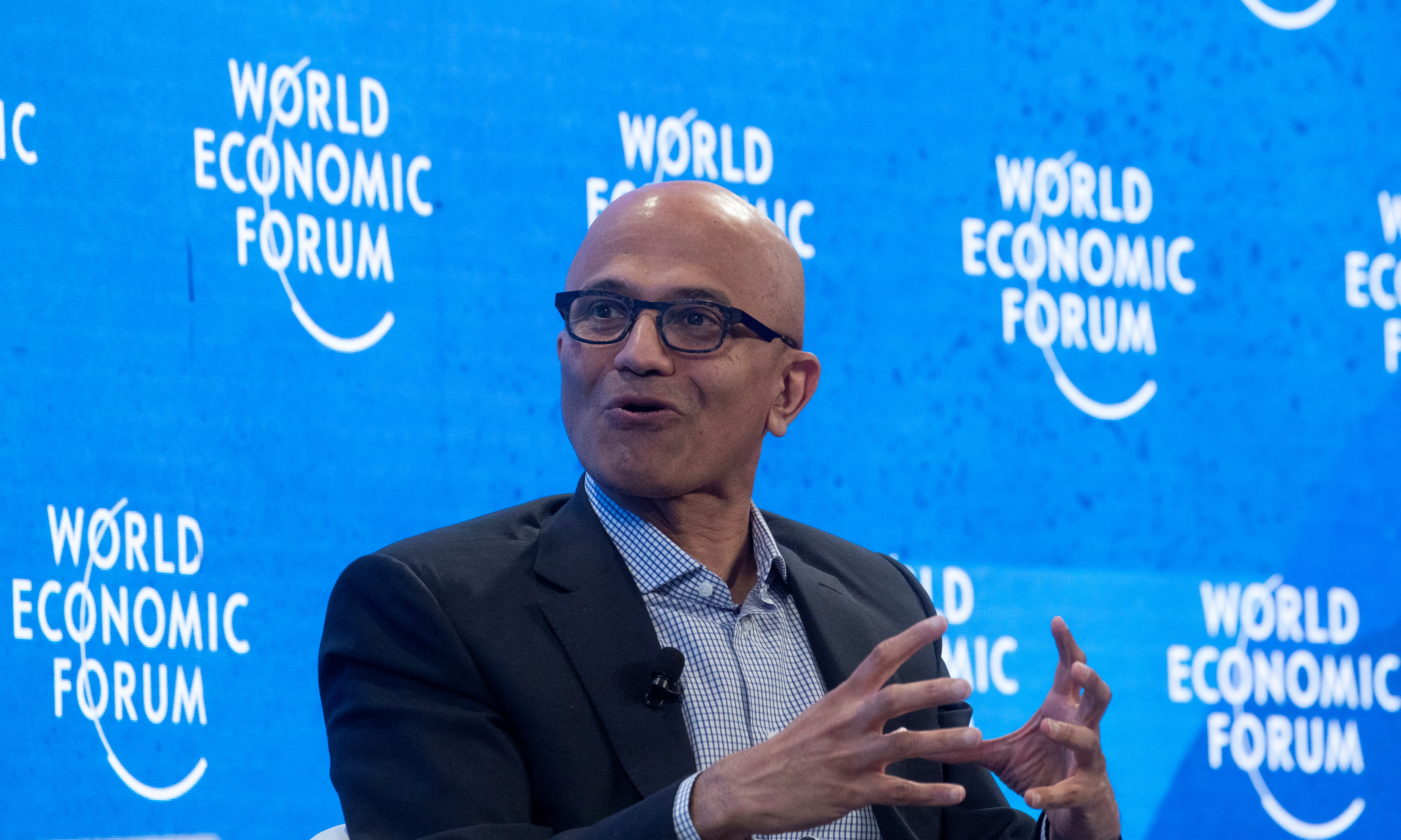 CEO of Microsoft Nadella speaks during a discussion at the World Economic Forum in Davos