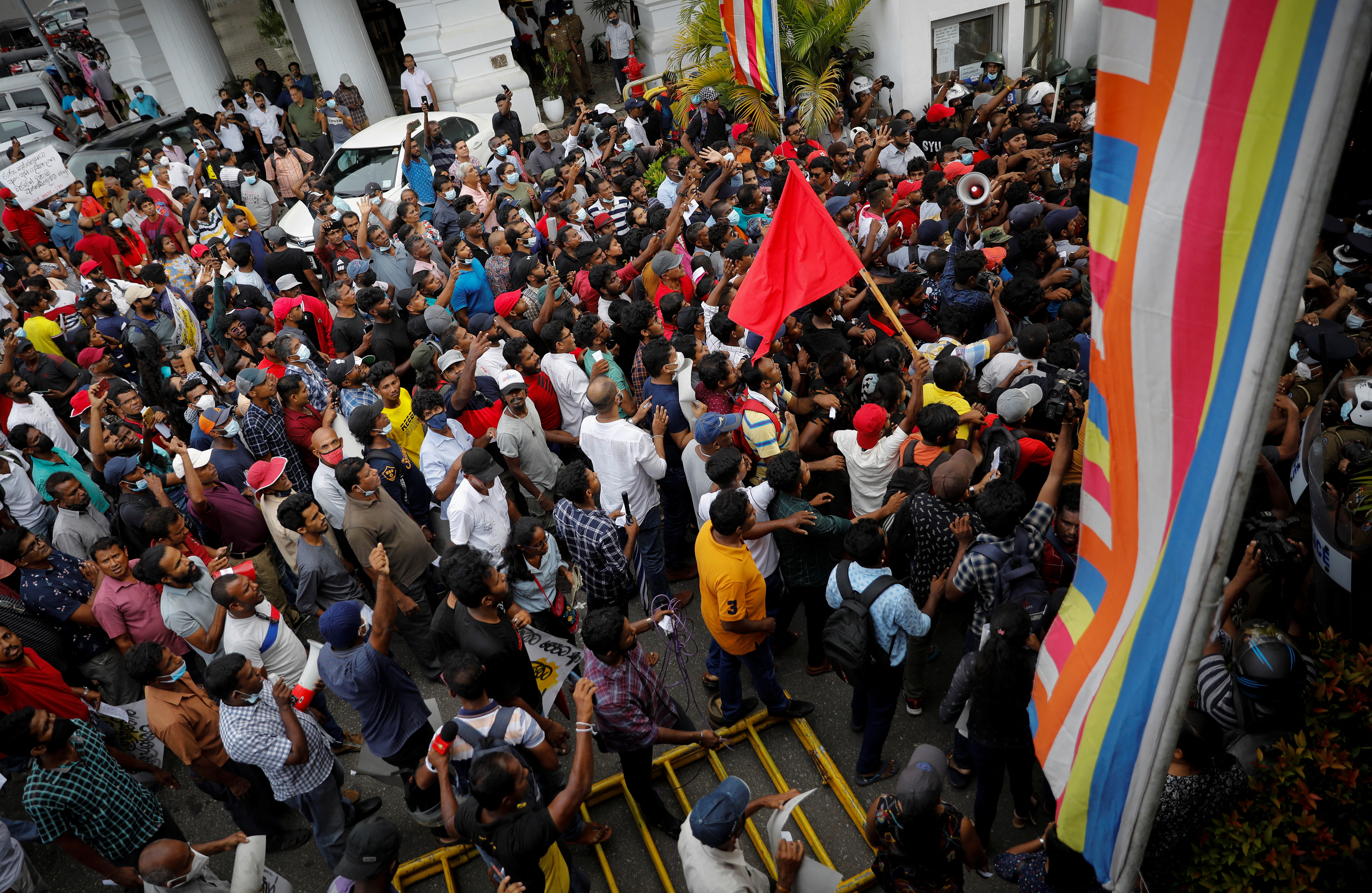 Anti-government demonstrators protest in front of police headquaters in Colombo