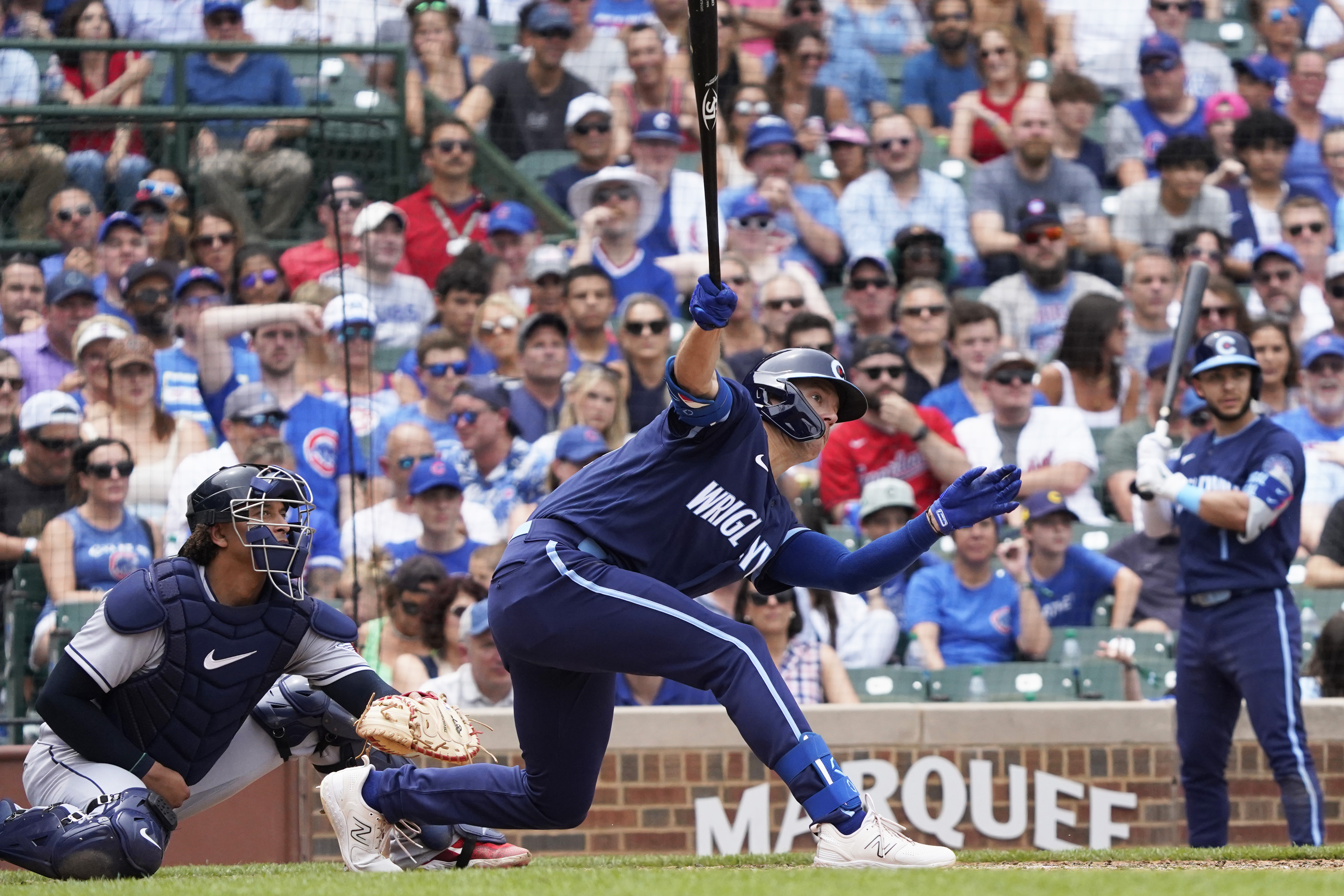 Justin Steele Yan Gomes Walking Off Field Image - Marquee Sports