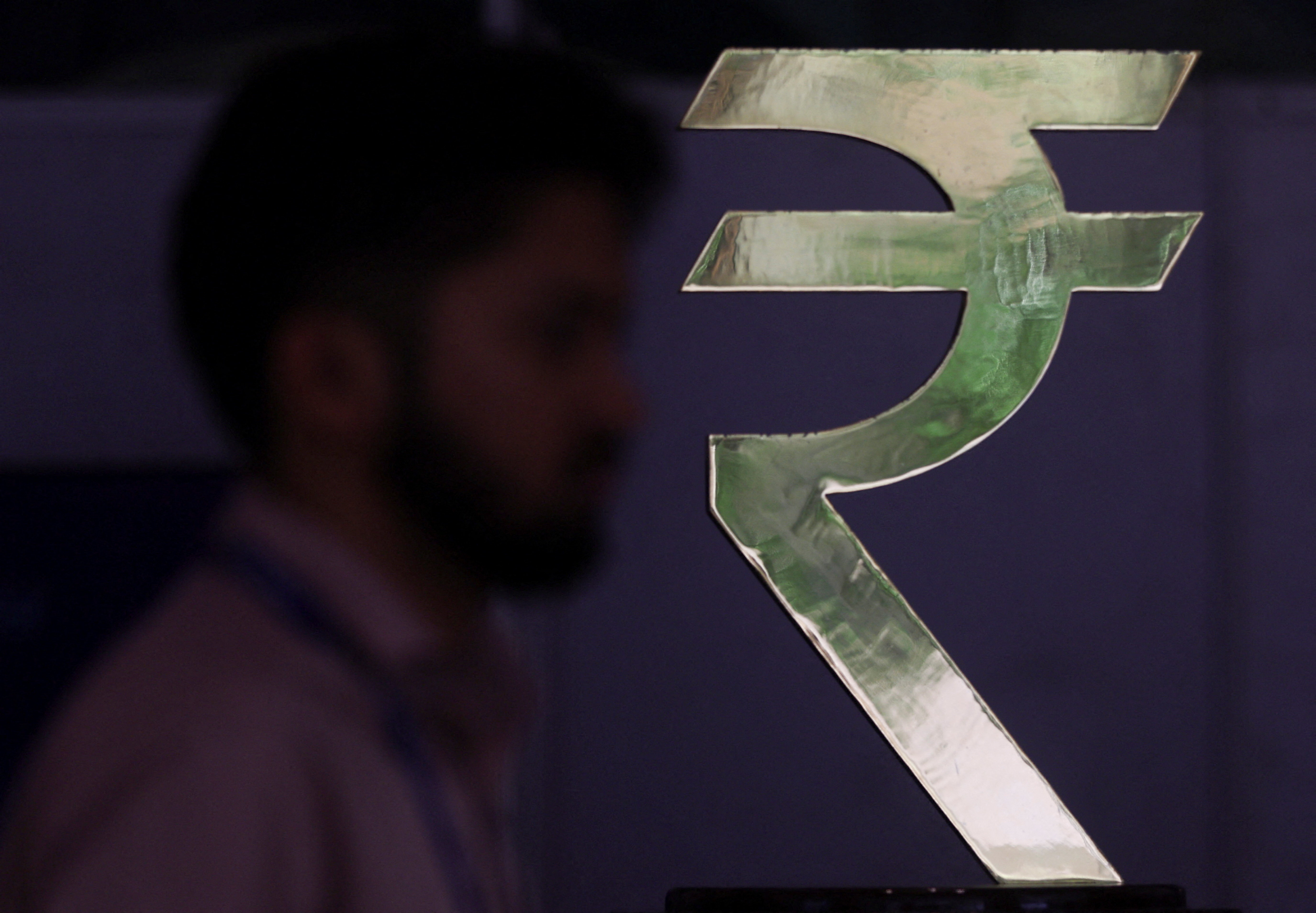 Rupee rises about 1% after RBI measures