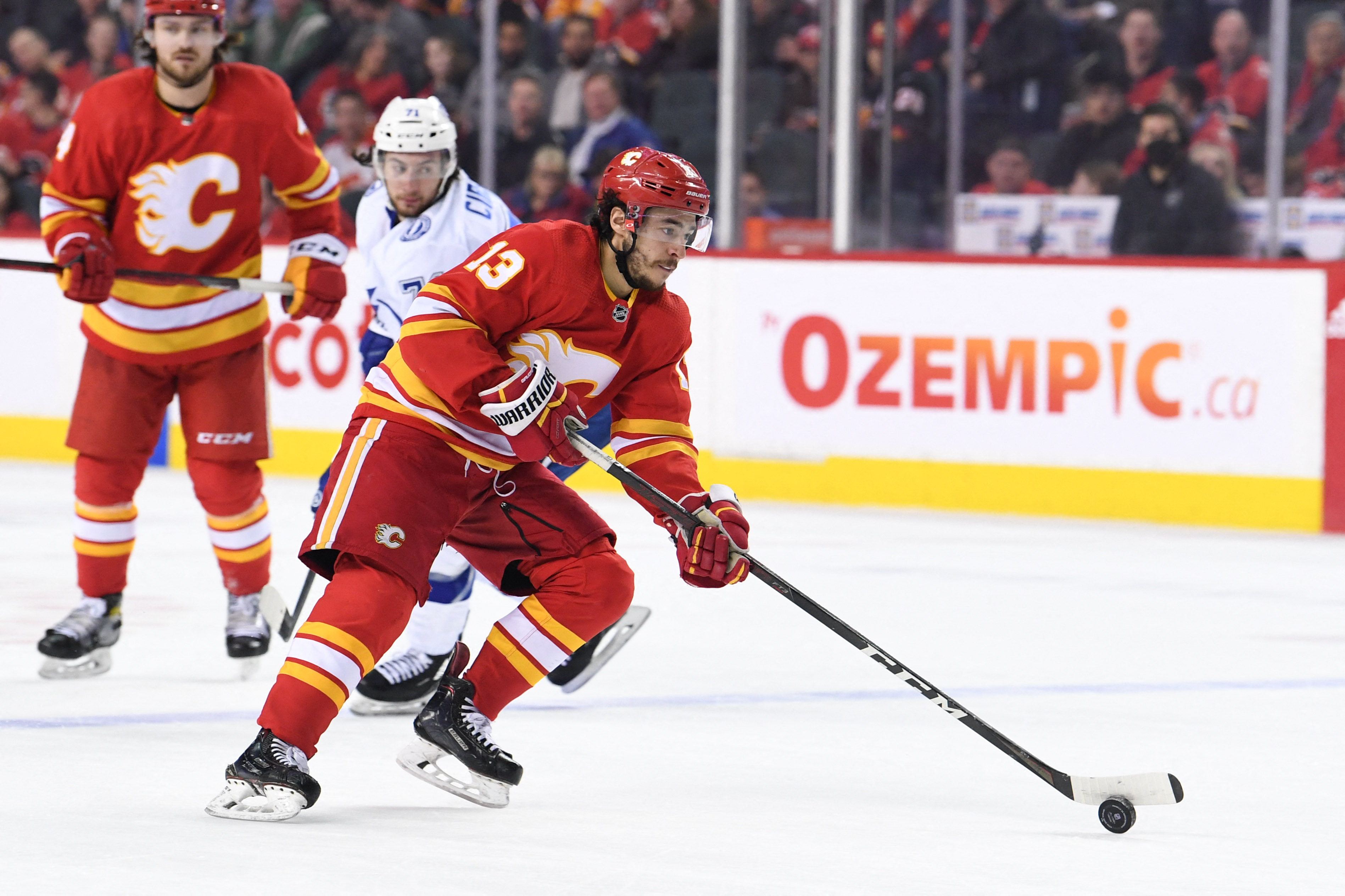 DeBrincat hat trick lifts Red Wings past Flames for 5th straight win
