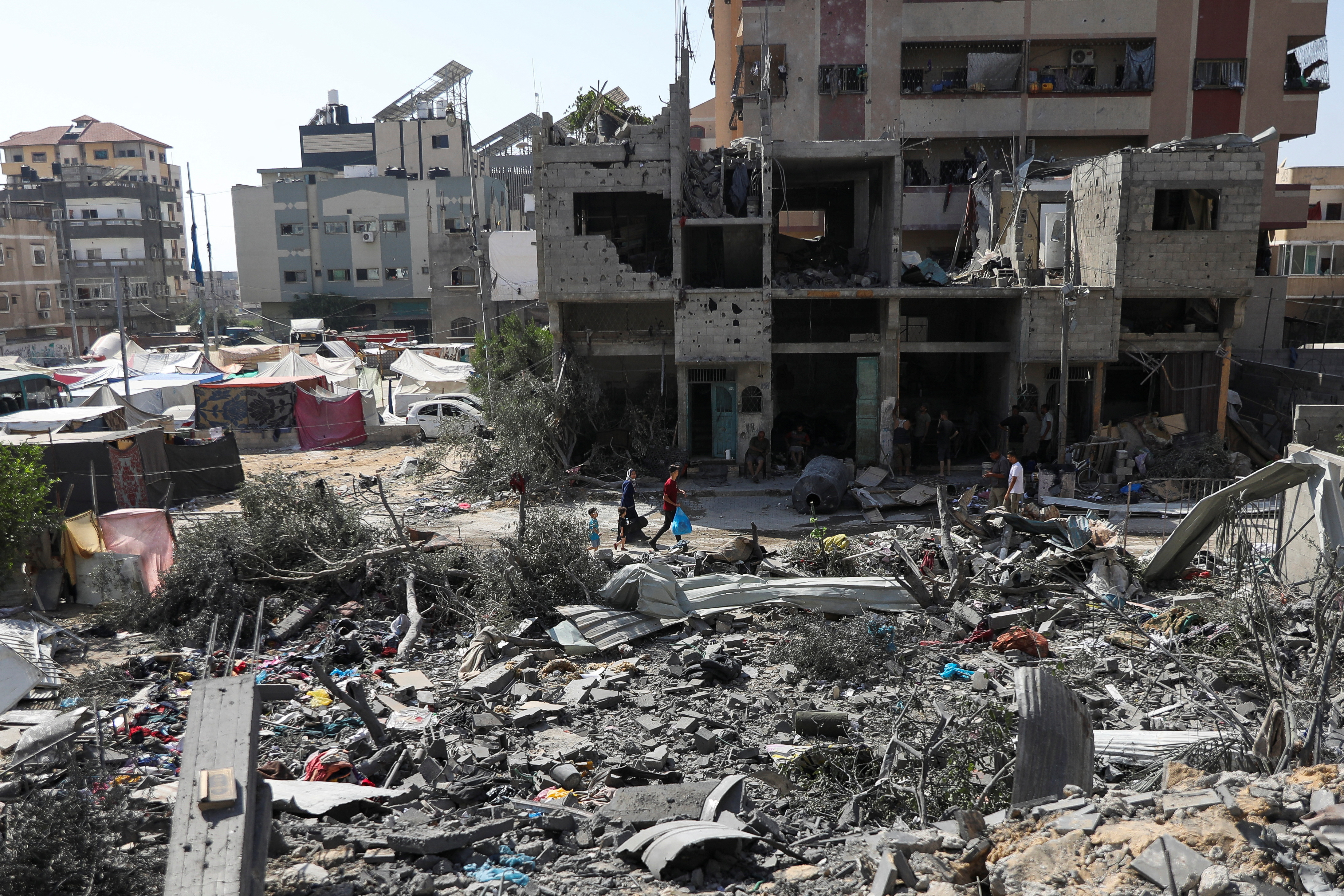 Aftermath of Israeli strikes at the area where Israeli hostages were rescued on Saturday, in Nuseirat refugee camp