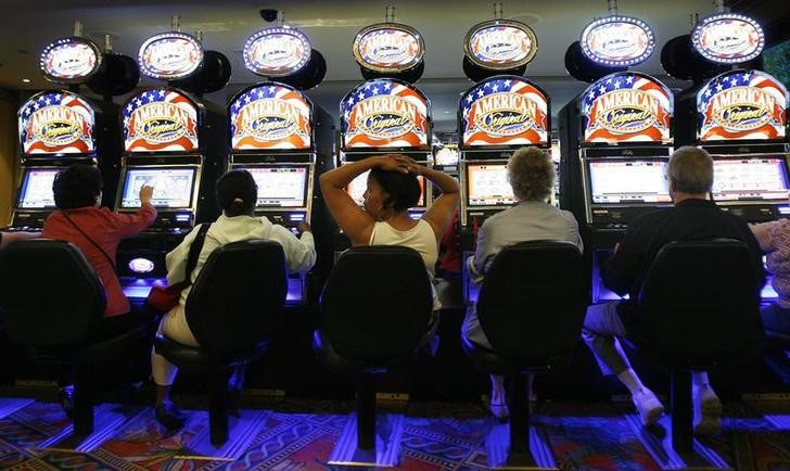 Gamers play the slot machines at the Empire City Casino in Yonkers, New York