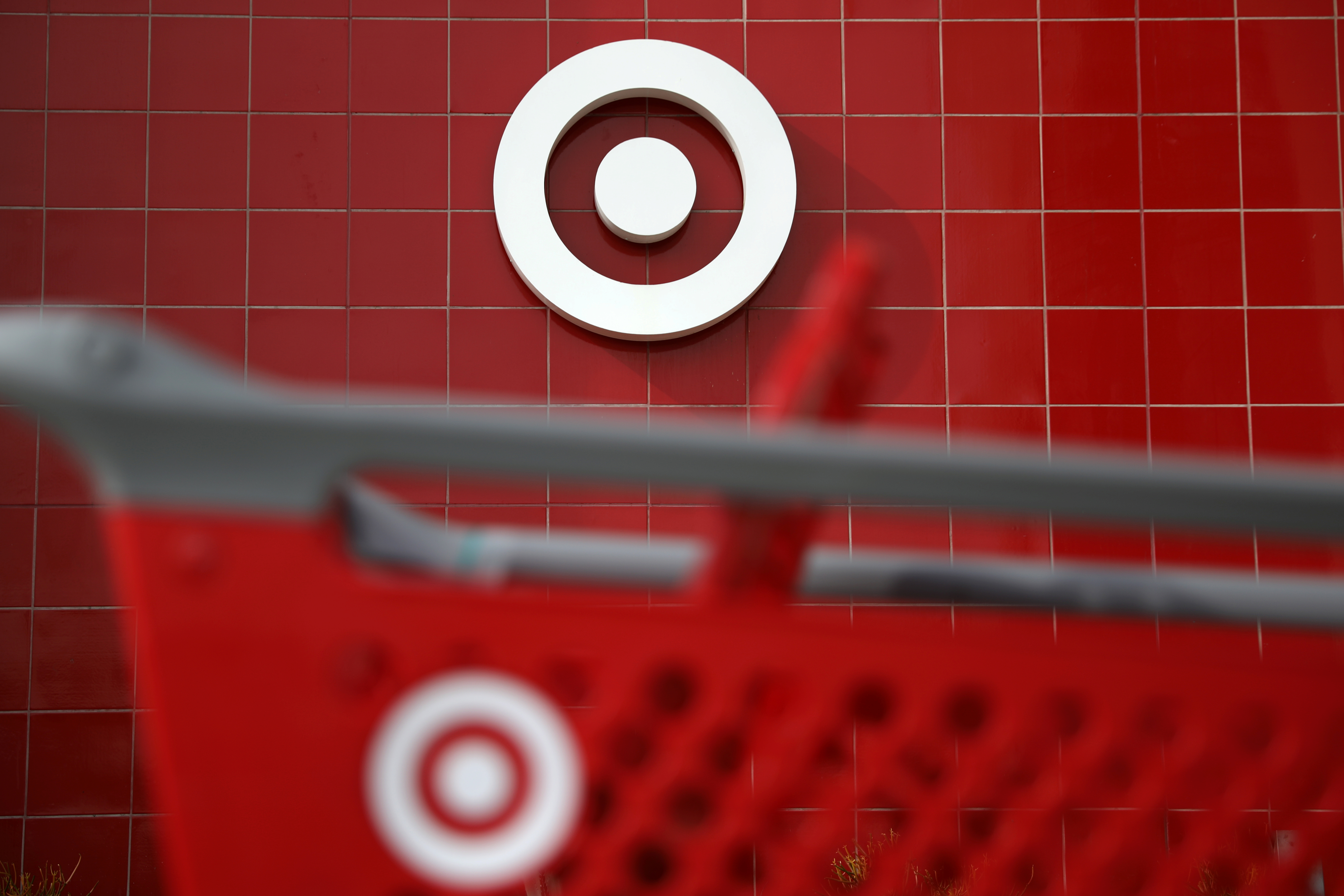 A Target shopping cart is seen in front of a store logo in Azusa